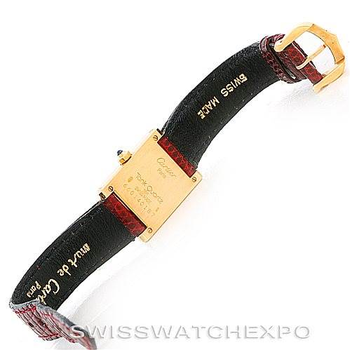 The image shows the back and strap of a Cartier Tank Classic Women's Yellow Gold White Dial Women's Yellow Gold White Dial watch at an oblique angle.