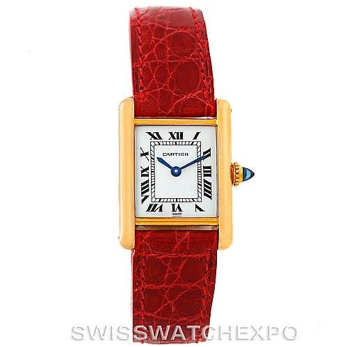 This image shows a Cartier Tank Classic Women's Yellow Gold White Dial Women's Yellow Gold White Dial watch from a front angle, highlighting its red leather strap and gold casing.
