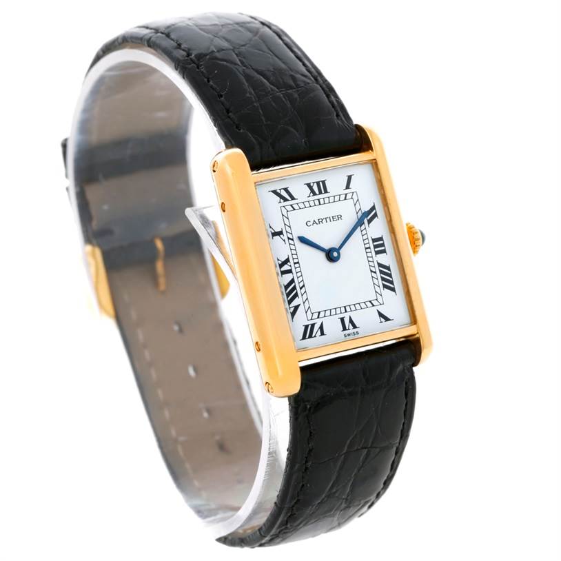 The image shows a Cartier Tank Classic Yellow Gold White Dial Yellow Gold White Dial watch from an angled view, highlighting the face, strap, and side detailing.