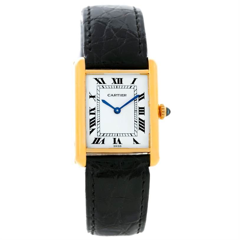 The image shows a front view of a Cartier Tank Classic Yellow Gold White Dial Yellow Gold White Dial watch, displaying its rectangular face, Roman numeral dial, and black leather strap.