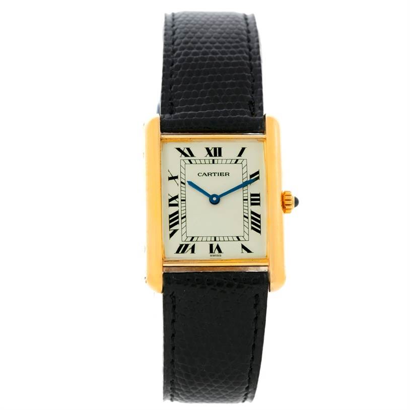 The image shows a front view of the Cartier Tank Classic Yellow Gold Beige Dial Yellow Gold Beige Dial model watch with a rectangular face and black leather strap.