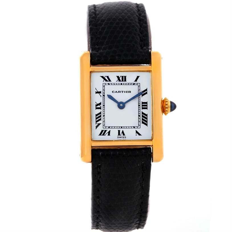 This Cartier Tank Classic Women's Yellow Gold White Dial Women's Yellow Gold White Dial watch is shown from the front, featuring its rectangular face, Roman numerals, and black strap.