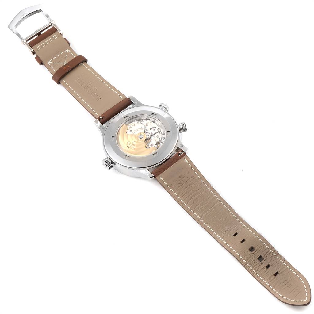 The image shows the back view of a Patek Philippe Calatrava 5524G Men's White Gold Blue Dial 5524G Men's White Gold Blue Dial watch, highlighting its leather strap and exposed mechanical movement.