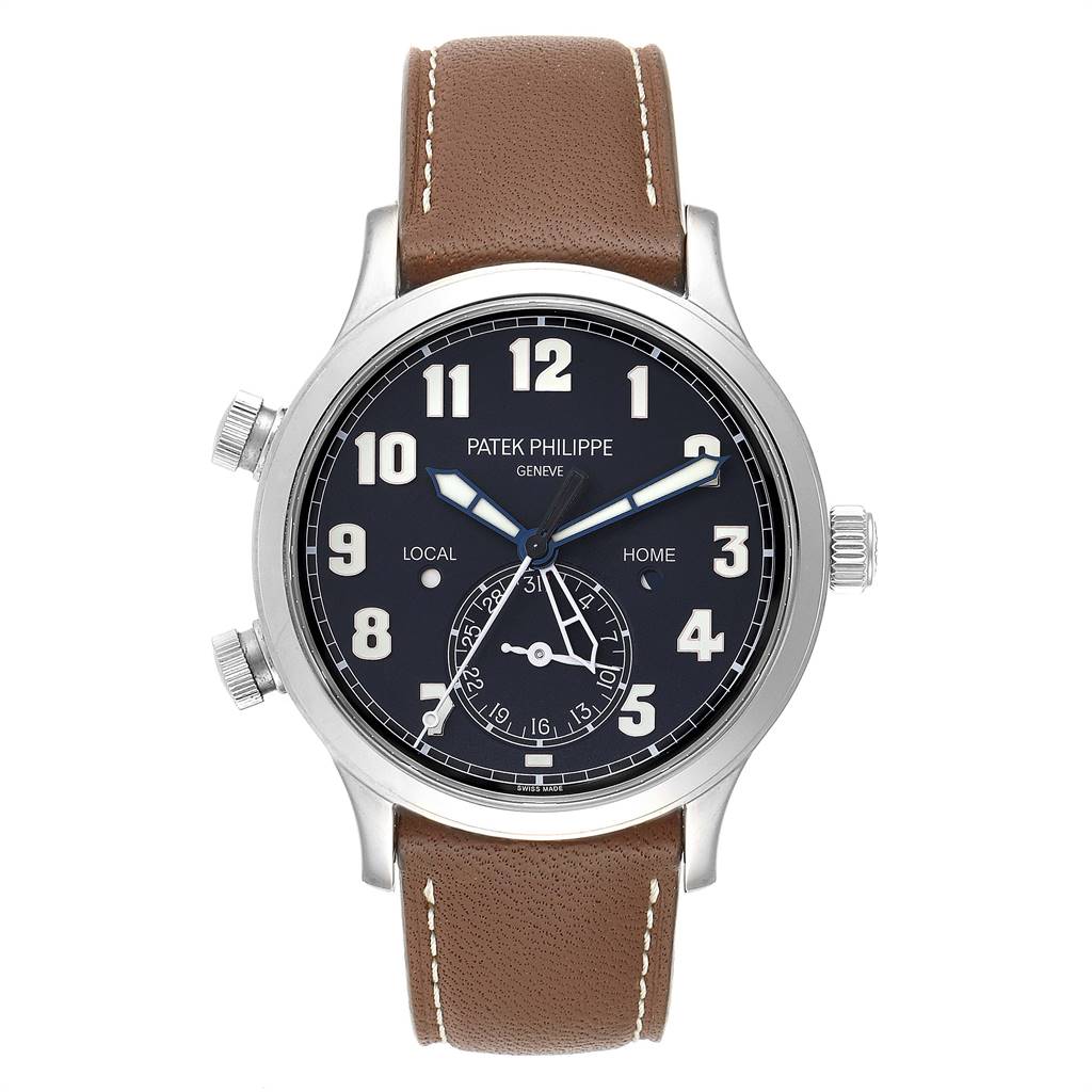 The image shows a front view of the Patek Philippe Calatrava 5524G Men's White Gold Blue Dial 5524G Men's White Gold Blue Dial watch with a brown leather strap and dark dial.