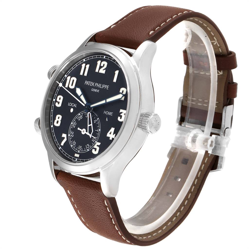 This image shows a Patek Philippe Calatrava 5524G Men's White Gold Blue Dial 5524G Men's White Gold Blue Dial watch from a three-quarter angle, highlighting its face, crown, and brown leather strap.