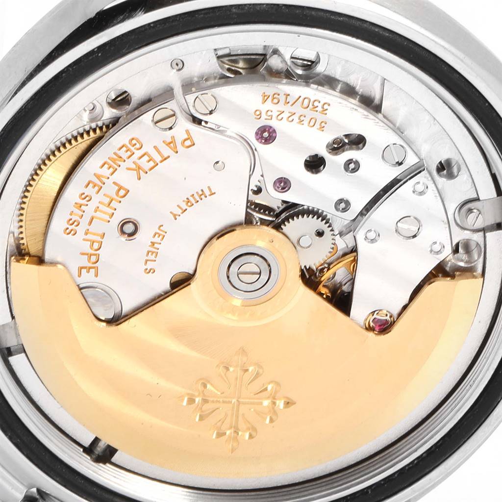 This image shows a close-up view of the movement mechanism of a Patek Philippe Aquanaut 5066 Men's Stainless Steel Black Dial 5066 Men's Stainless Steel Black Dial watch.