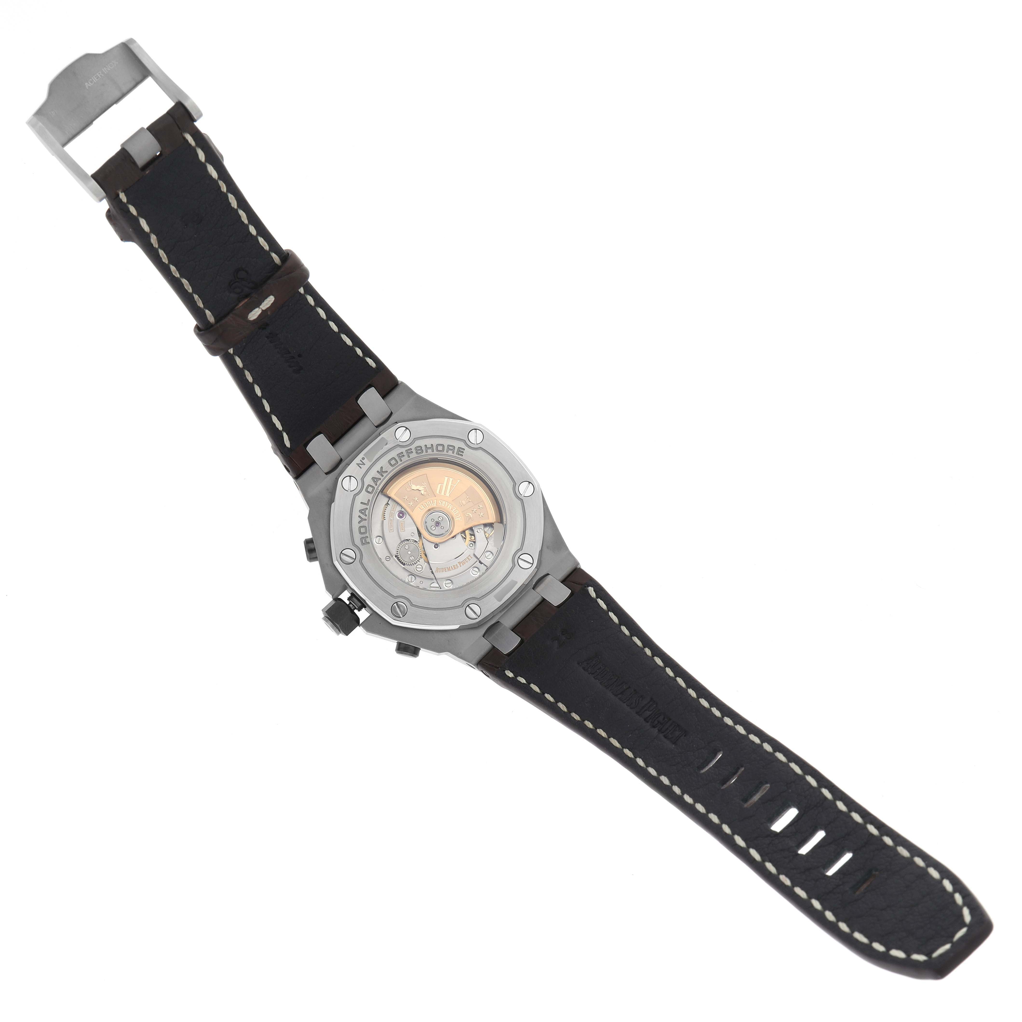 The Audemars Piguet Royal Oak Offshore model 26470ST.OO.A801CR.01 is shown from the back, displaying the movement and part of the black leather strap.