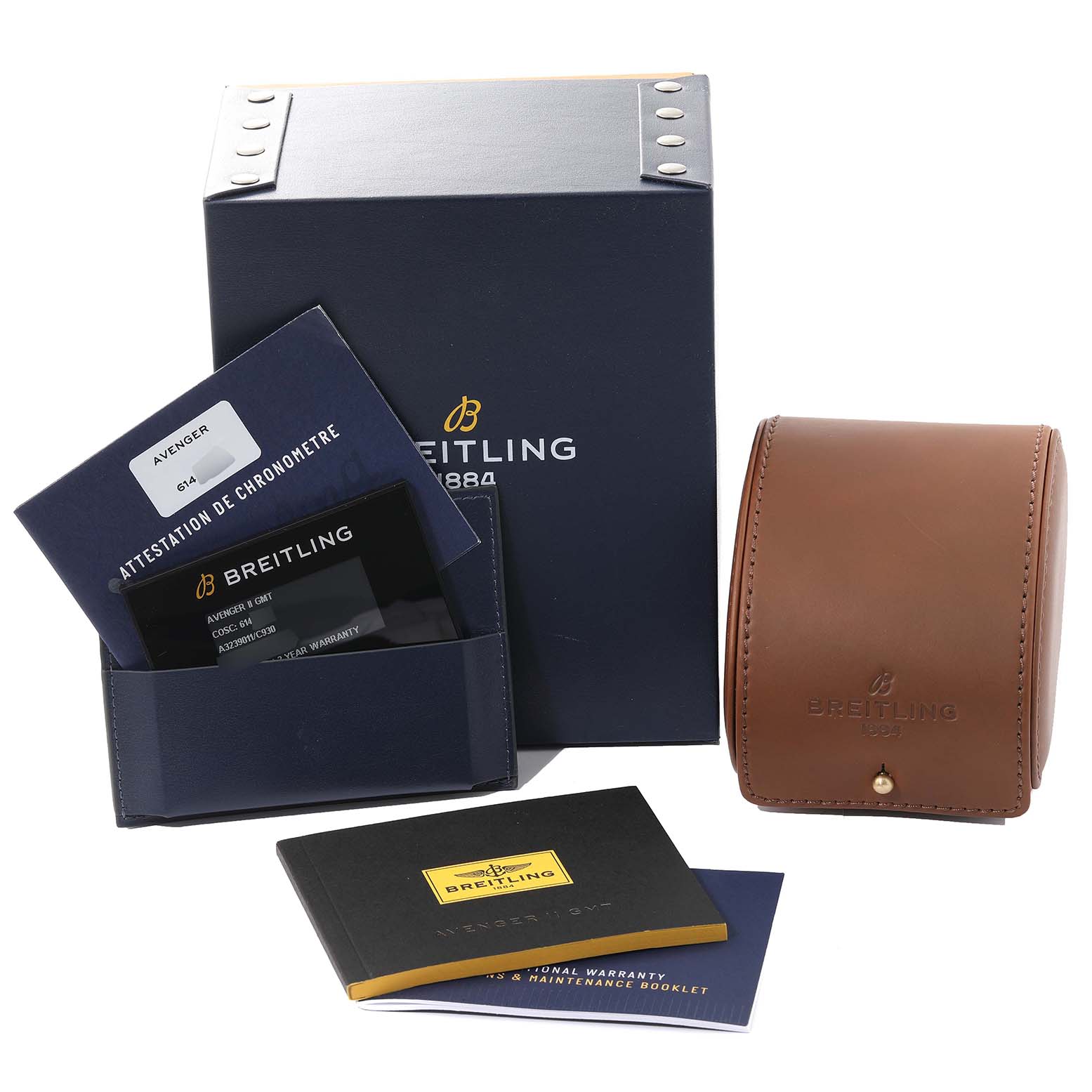 The image shows packaging, documents, and a leather case for the Breitling Avenger A3239011/C930 Men's Stainless Steel Mother of Pearl Dial A3239011/C930 Men's Stainless Steel Mother of Pearl Dial model watch, viewed from the front.
