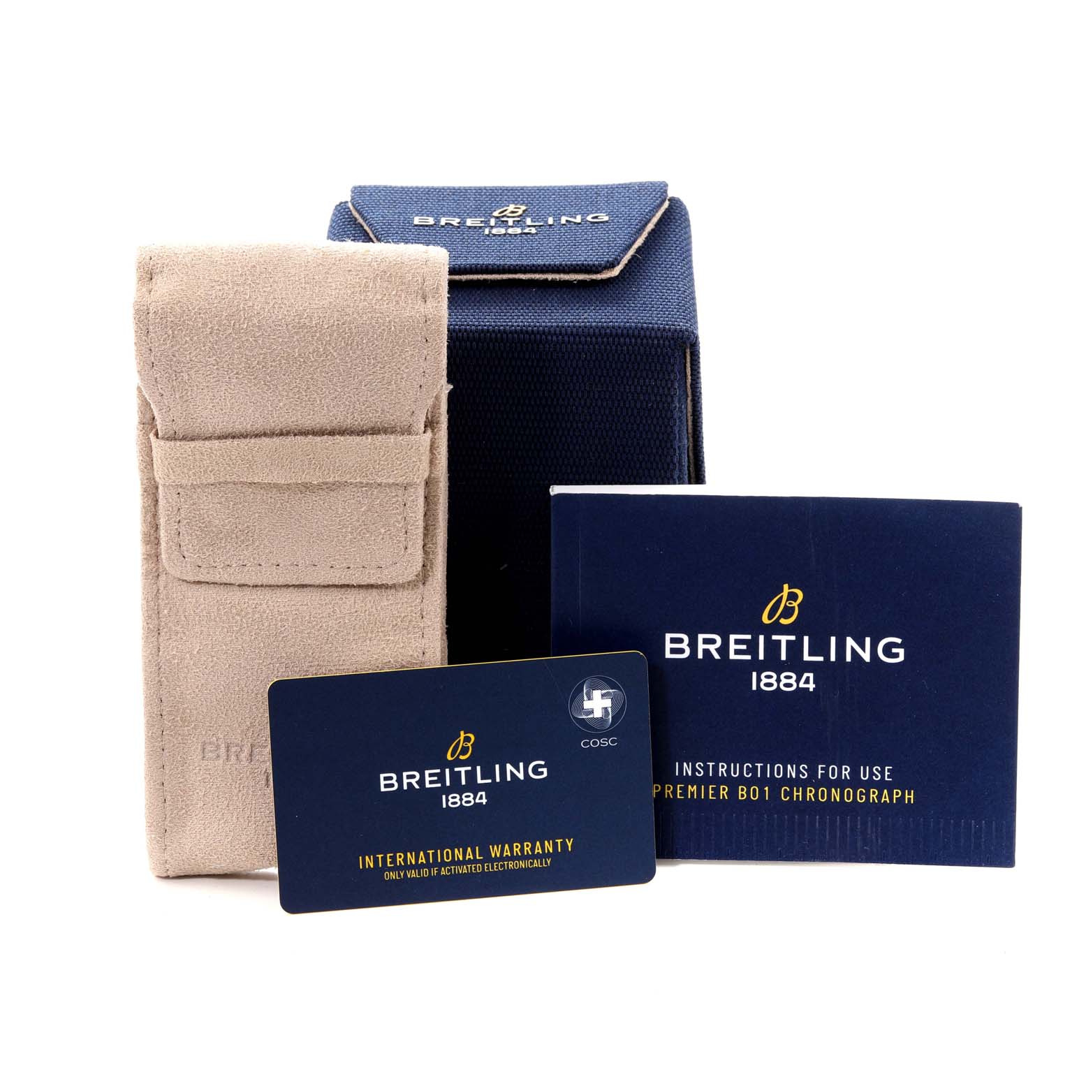 The image shows accessories for the Breitling Premier AB0118/AB0118A71G1P1 Men's Stainless Steel Silver Dial AB0118/AB0118A71G1P1 Men's Stainless Steel Silver Dial watch, including a carrying case, warranty card, and instruction booklet.