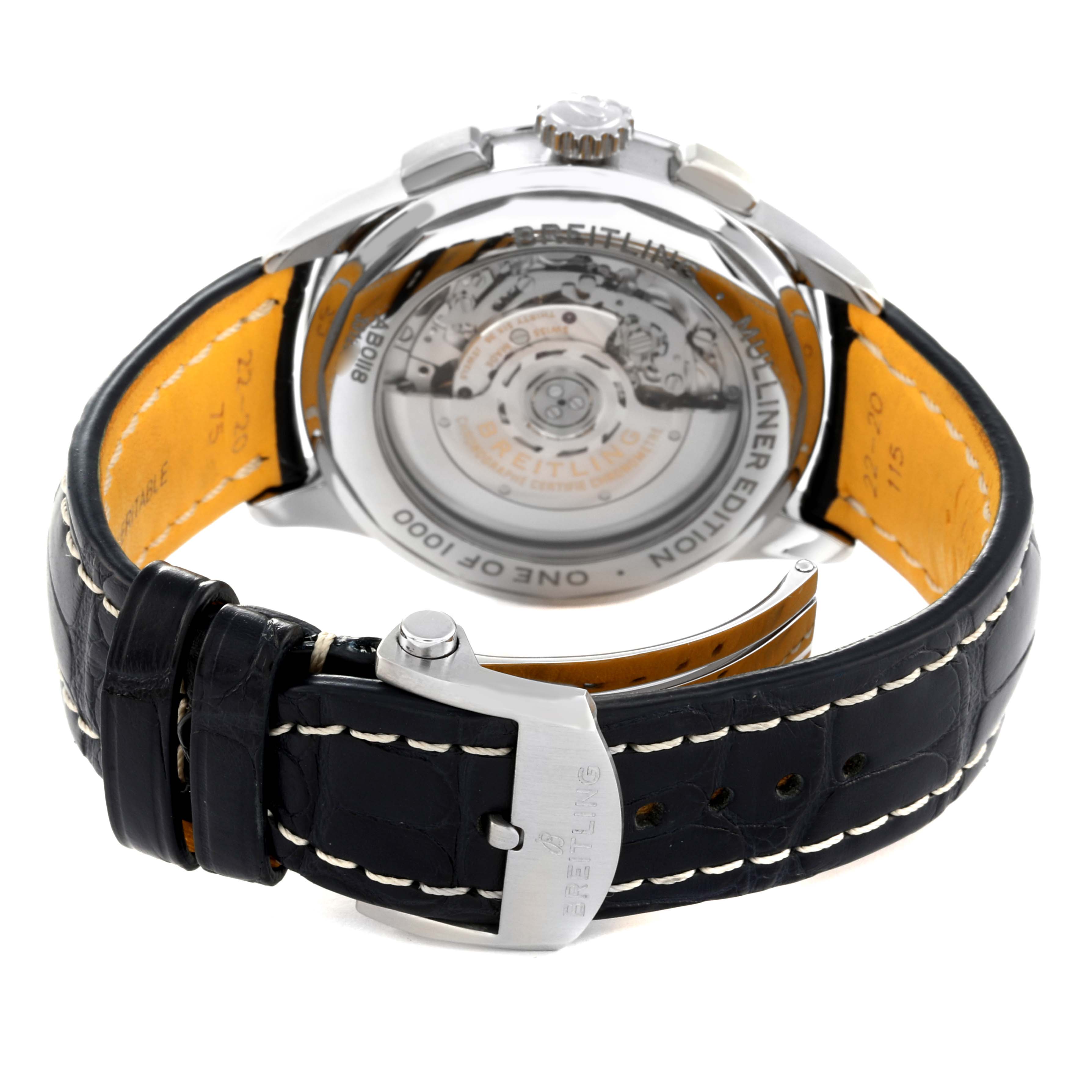 The image shows the back view of a Breitling Premier AB0118/AB0118A71G1P1 Men's Stainless Steel Silver Dial AB0118/AB0118A71G1P1 Men's Stainless Steel Silver Dial watch, highlighting its movement and black leather strap with a clasp.