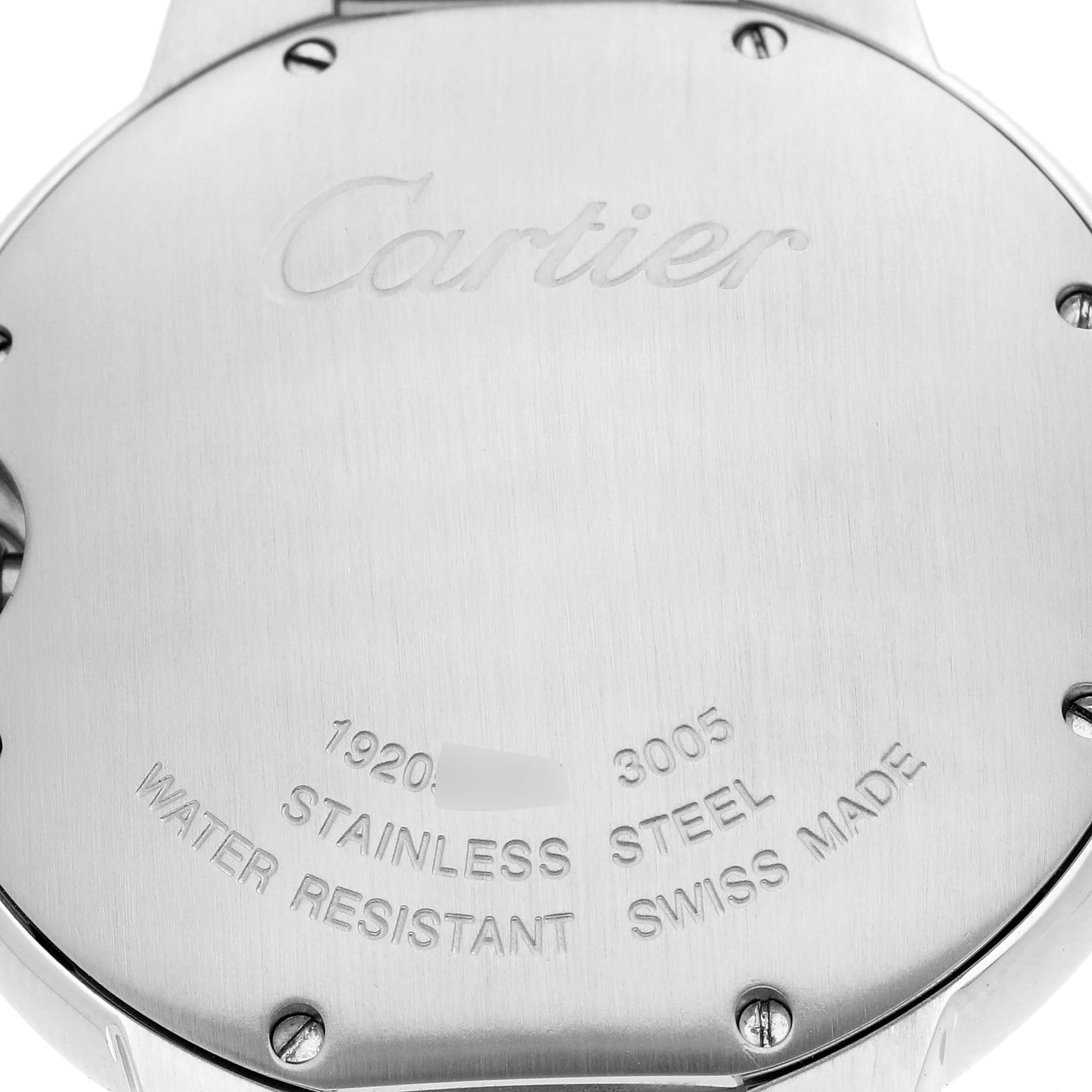The image shows the back case of a Cartier Ballon Bleu model number W69011Z4, highlighting the brand engraving and details like "STAINLESS STEEL" and "SWISS MADE".