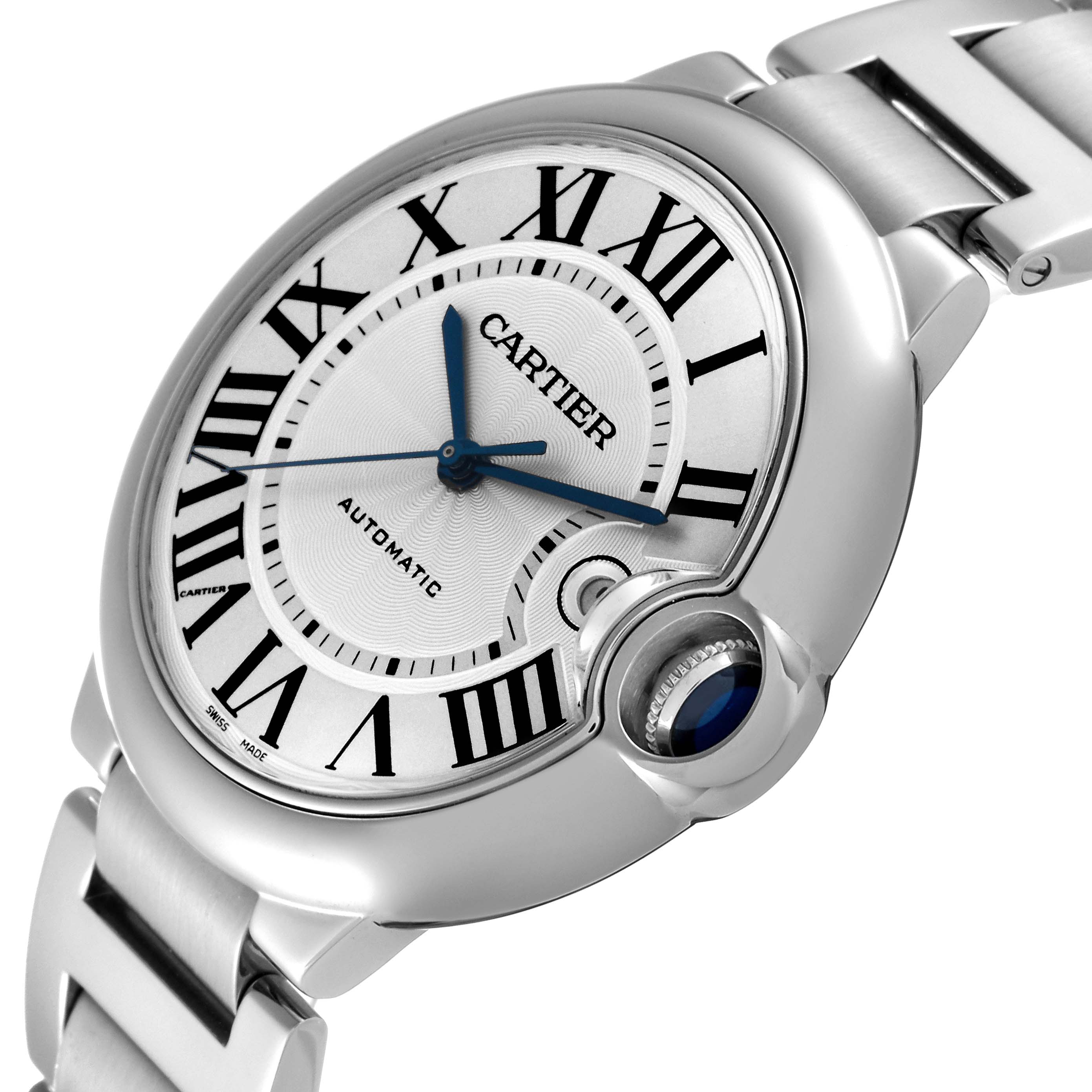 The image shows a close-up angled view of the Ballon Bleu de Cartier watch, highlighting its dial, bracelet, and crown.