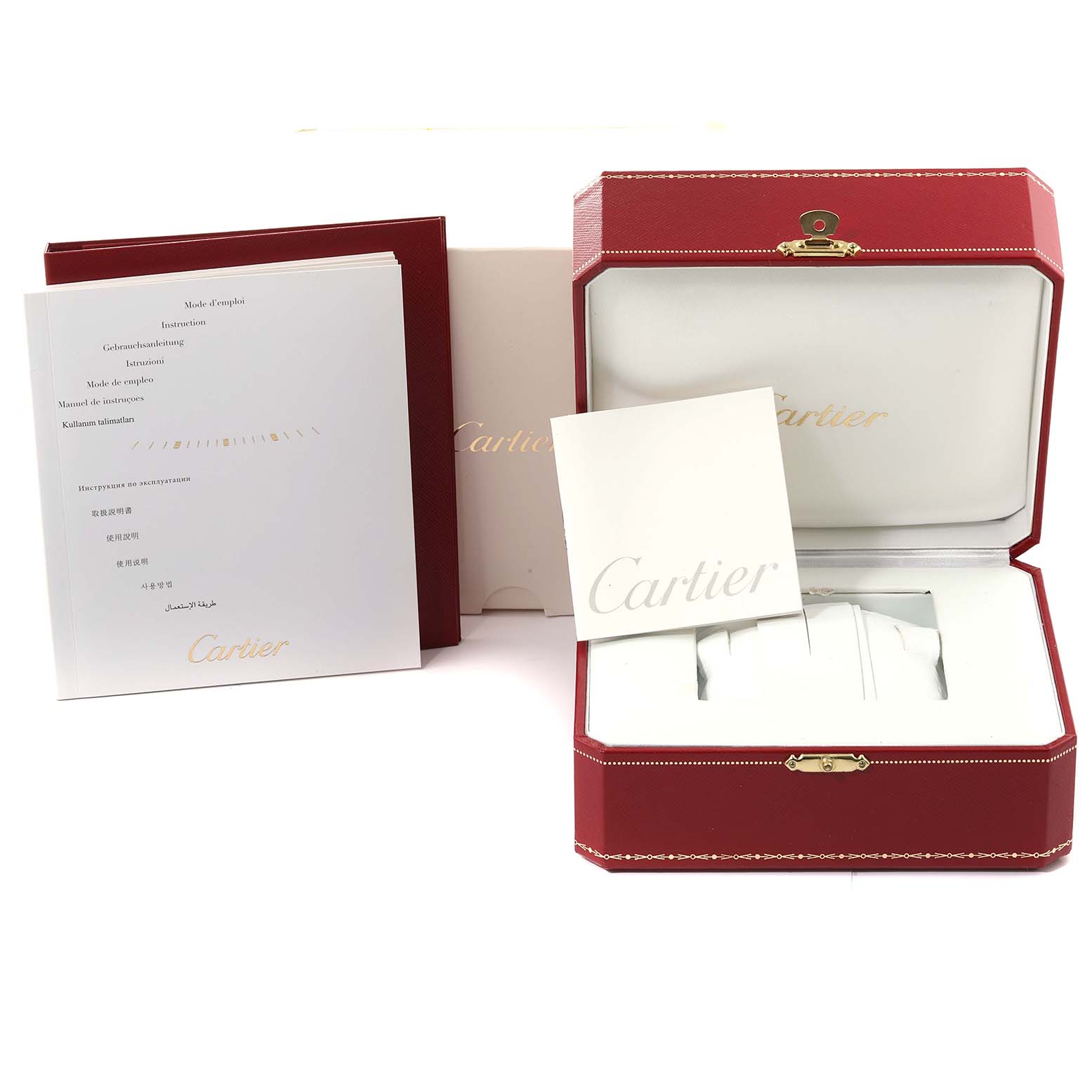 The image shows the packaging and documentation for a Cartier Ballon Bleu W69012Z4 Men
s Stainless Steel Silver Dial W69012Z4 Men
s Stainless Steel Silver Dial watch, including a red watch box and instruction booklets.