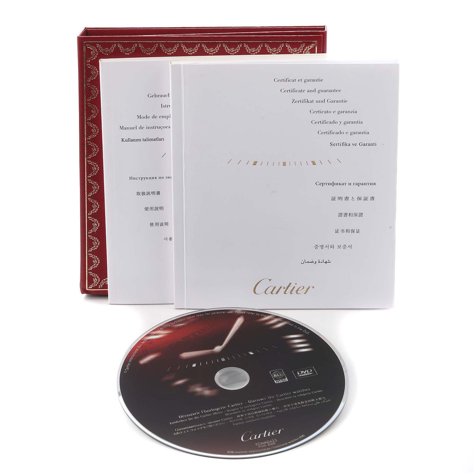 The image shows the Cartier Ballon Bleu model W69008Z3 watch accessories, including a red box, manuals, and a DVD, all shown from a top-down angle.