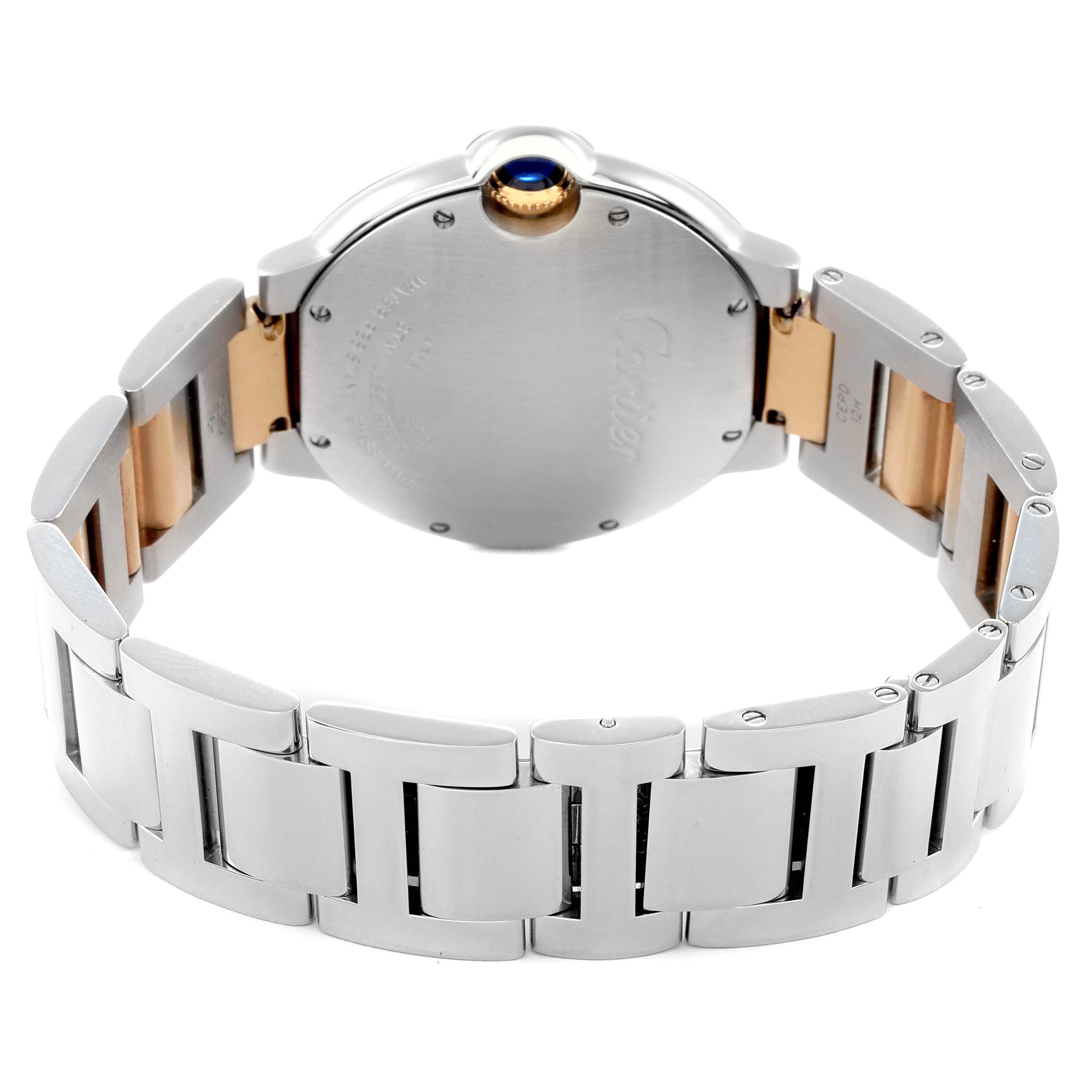 The image shows the back of a Cartier Ballon Bleu model W69008Z3 men's watch, featuring the case back and the metal bracelet in a two-tone design.