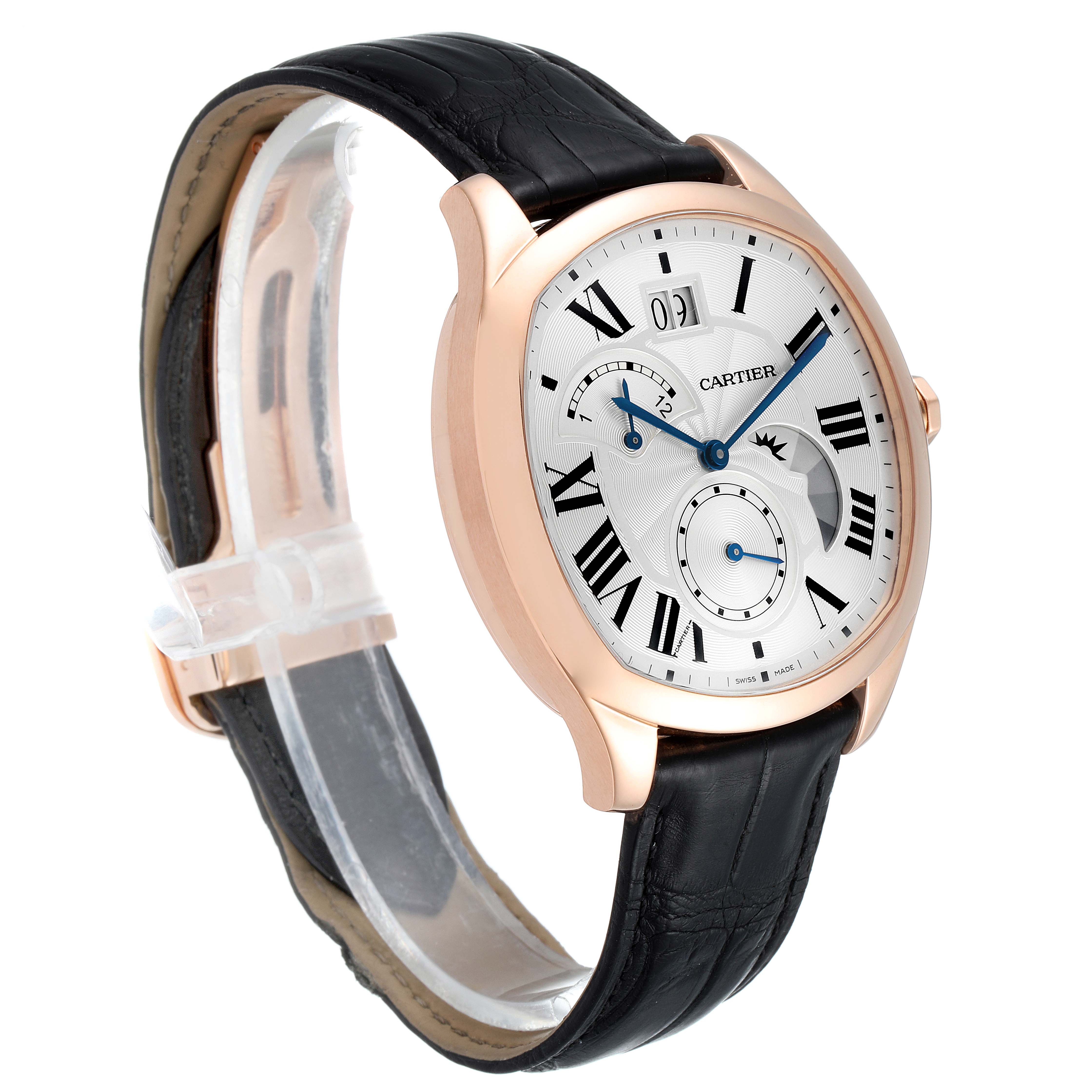 The Drive de Cartier watch is shown at a three-quarter angle, highlighting its face, Roman numerals, sub-dials, and leather strap.