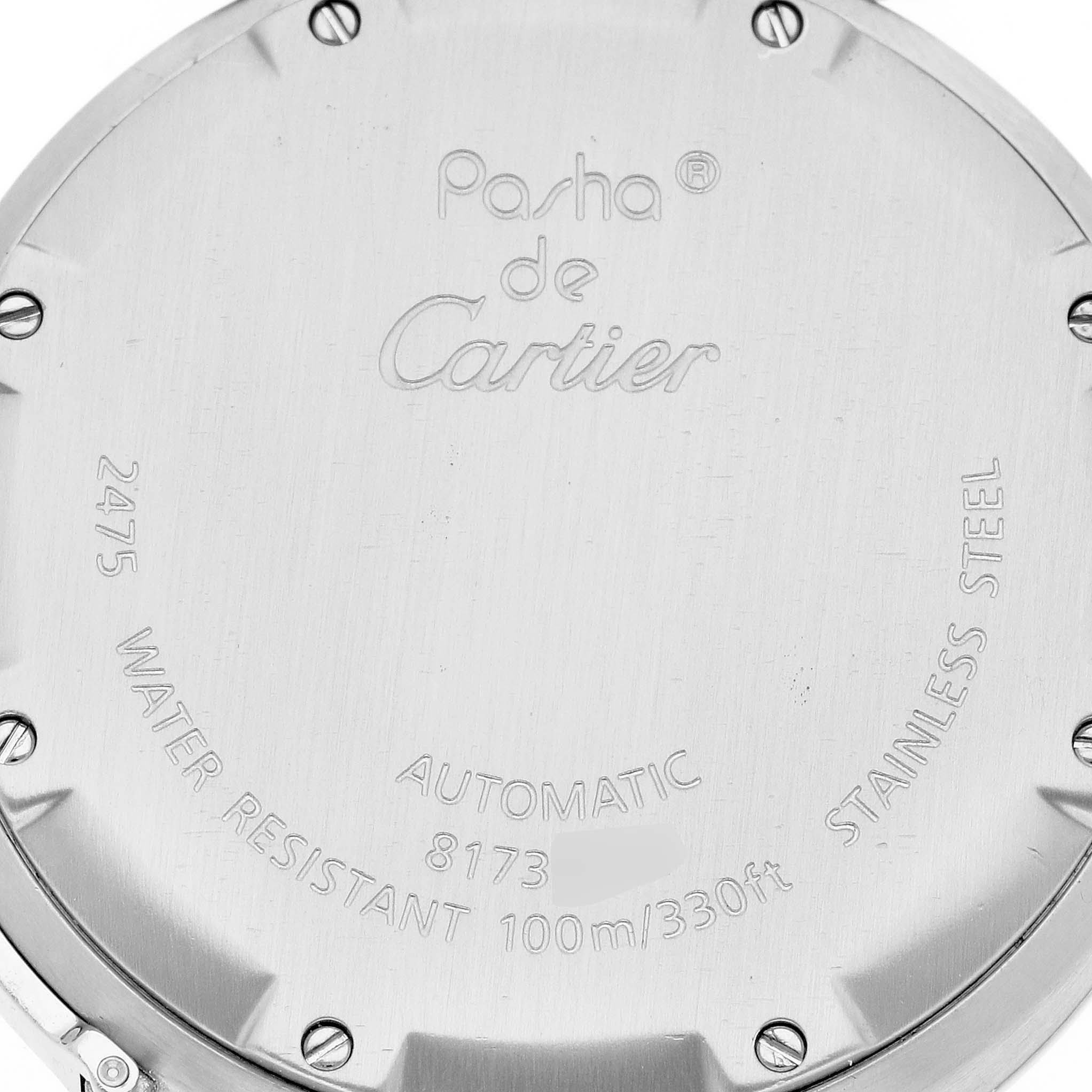 The image shows the back case of a Cartier Pasha W31058M7 Women's Stainless Steel Pink Dial W31058M7 Women's Stainless Steel Pink Dial watch, displaying model information, water resistance, and material details.