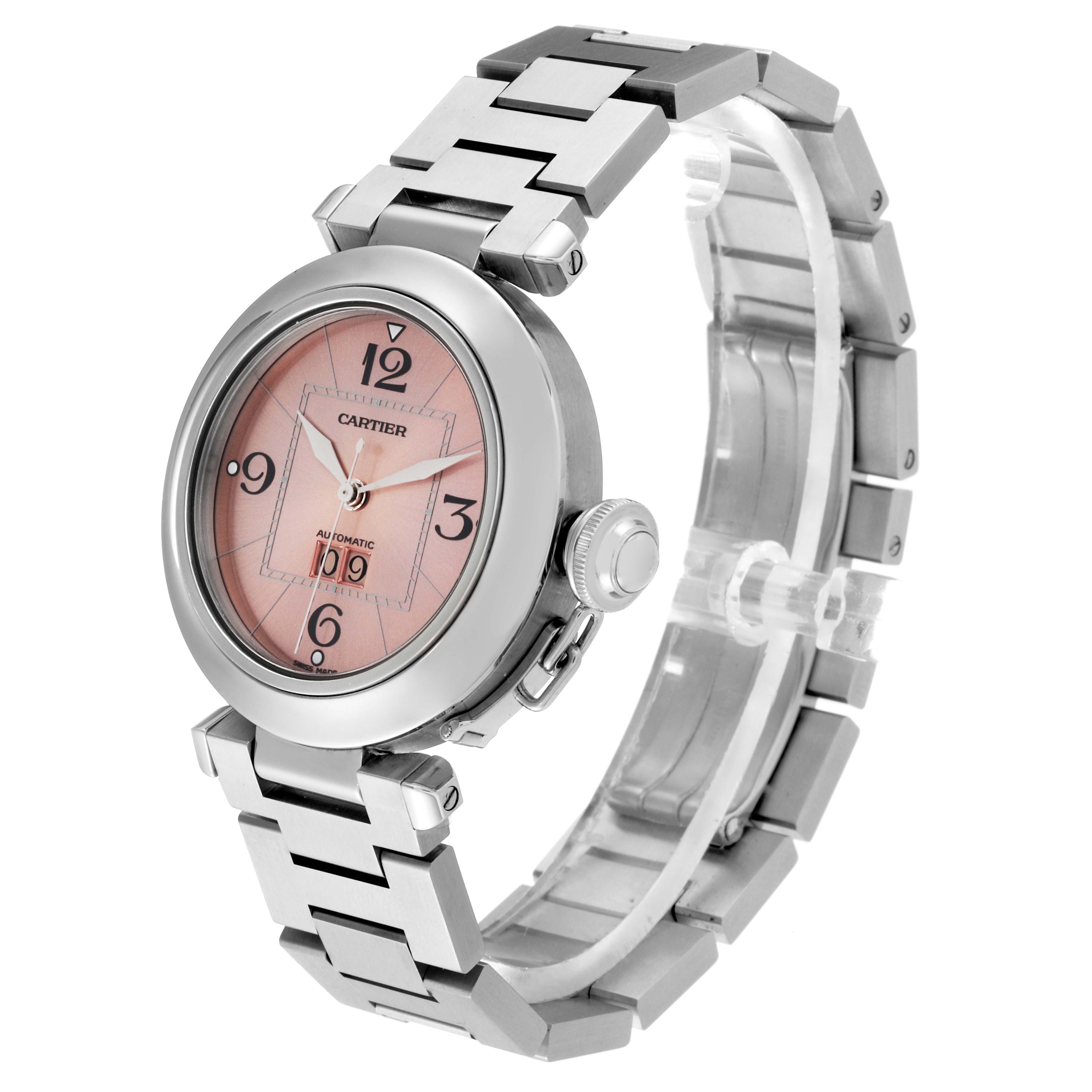 The Cartier Pasha W31058M7 Women's Stainless Steel Pink Dial W31058M7 Women's Stainless Steel Pink Dial model watch is shown at a three-quarter angle, highlighting its bracelet, crown, and pink watch face.