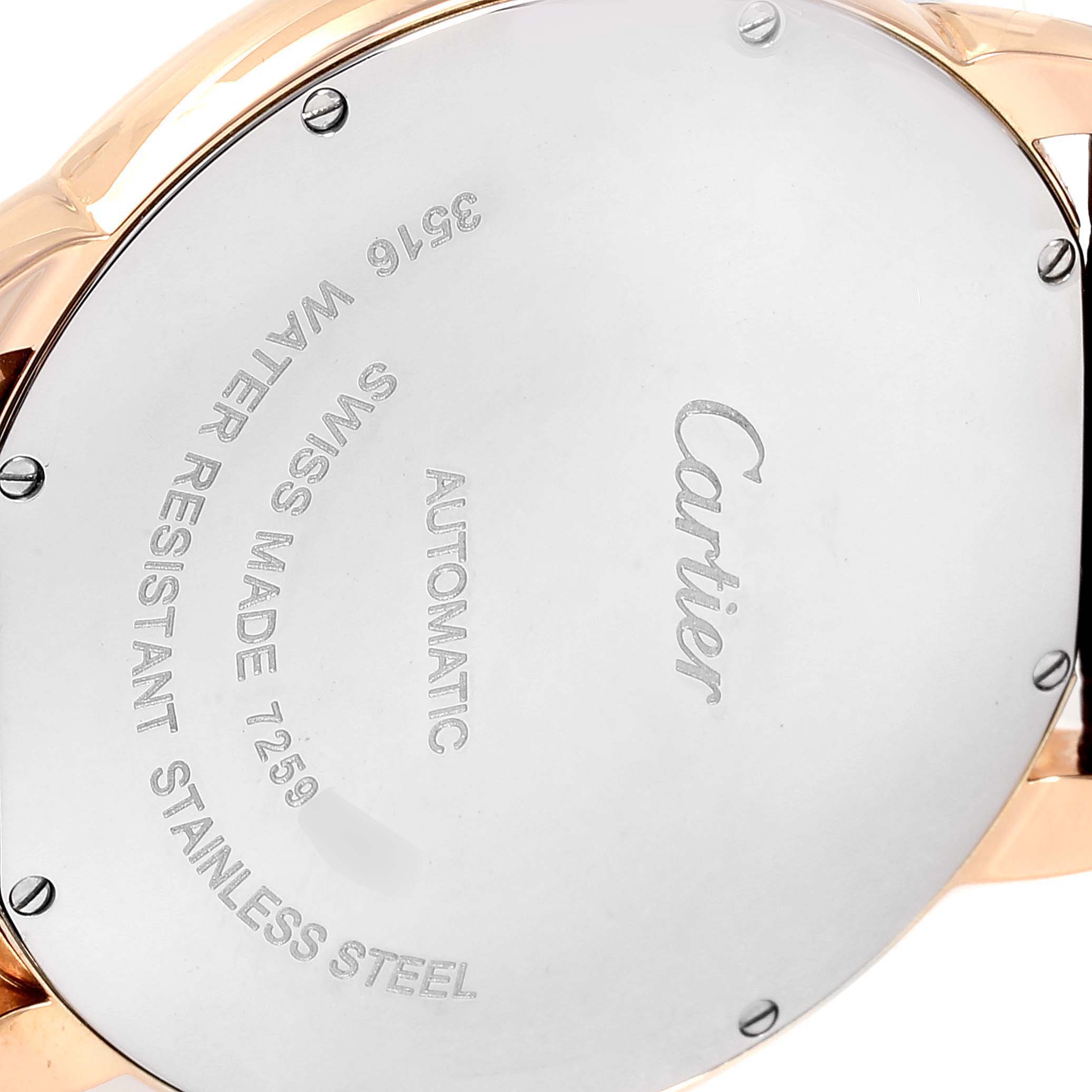 This image shows the back case of the Ronde model watch by Cartier, highlighting inscriptions and screws.
