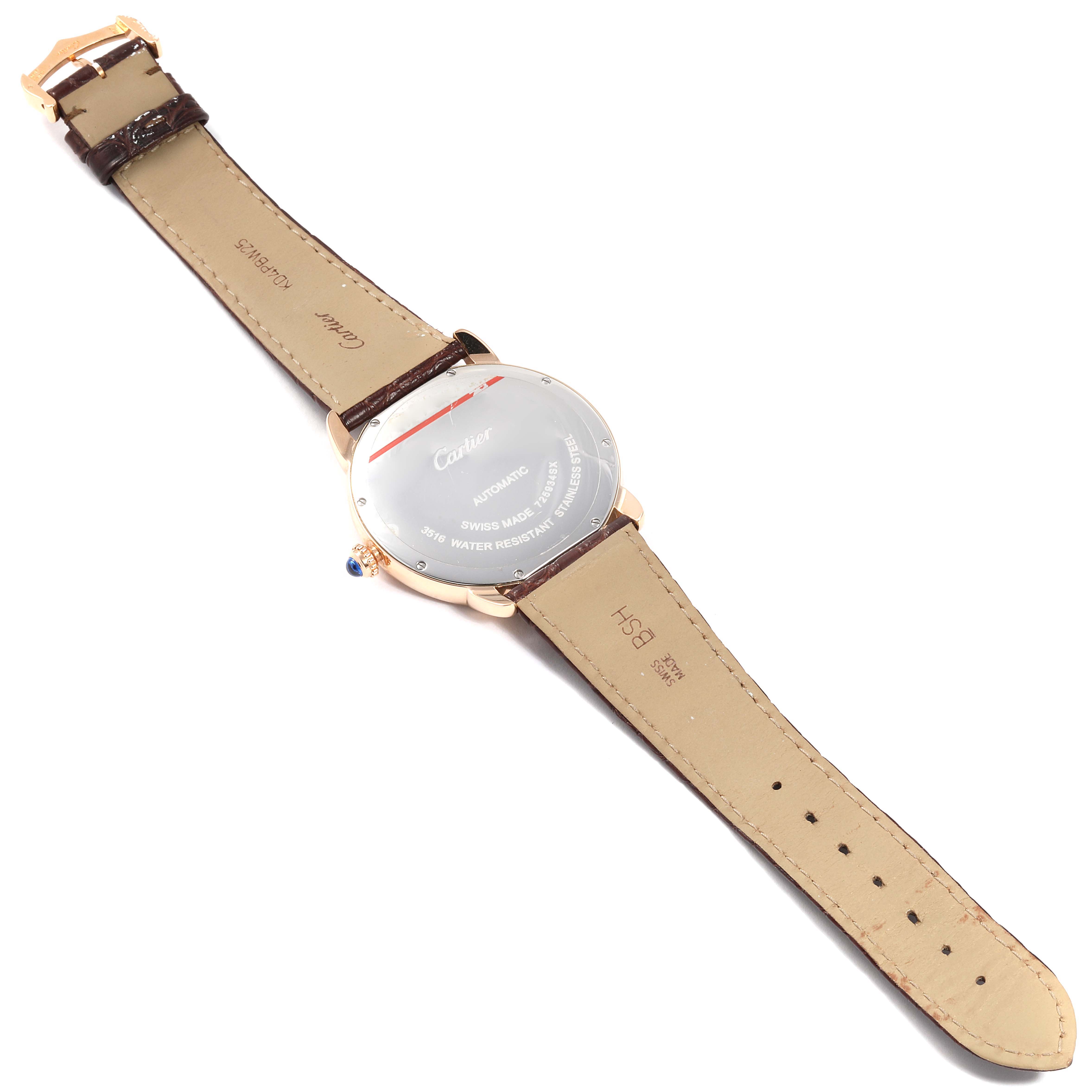 The image shows the back view of the Ronde watch by Cartier, displaying the case back, crown, and leather strap.