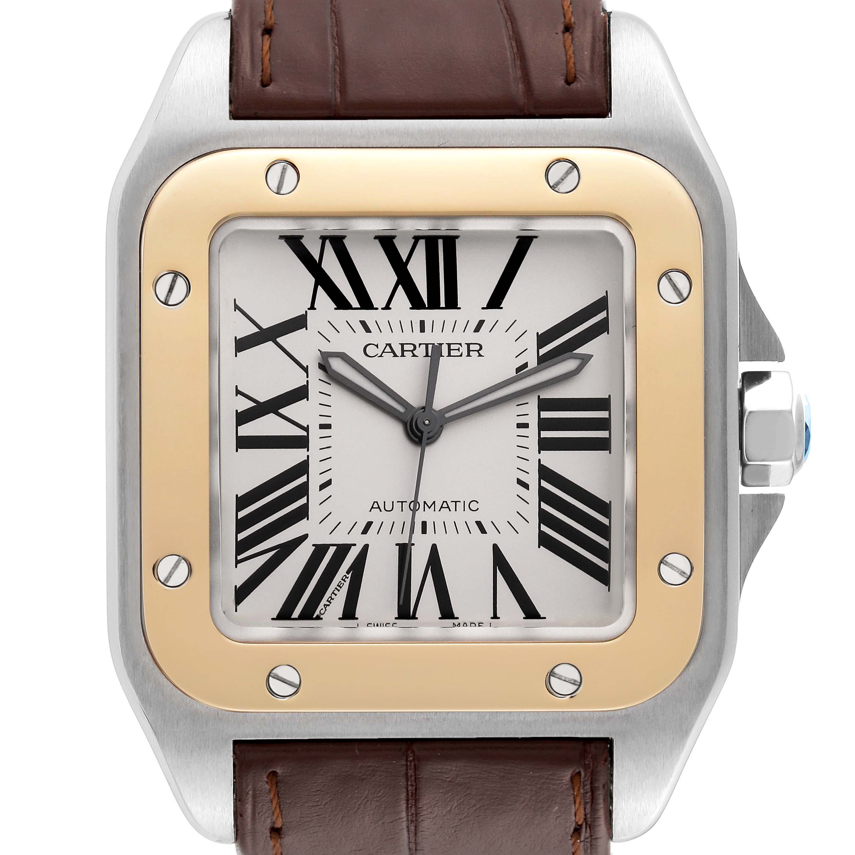 The image shows a frontal view of the Cartier Santos W20072X7 Men
s Steel and Gold (two tone) Silver Dial W20072X7 Men
s Steel and Gold (two tone) Silver Dial watch, highlighting its dial, bezel, and part of the leather strap.