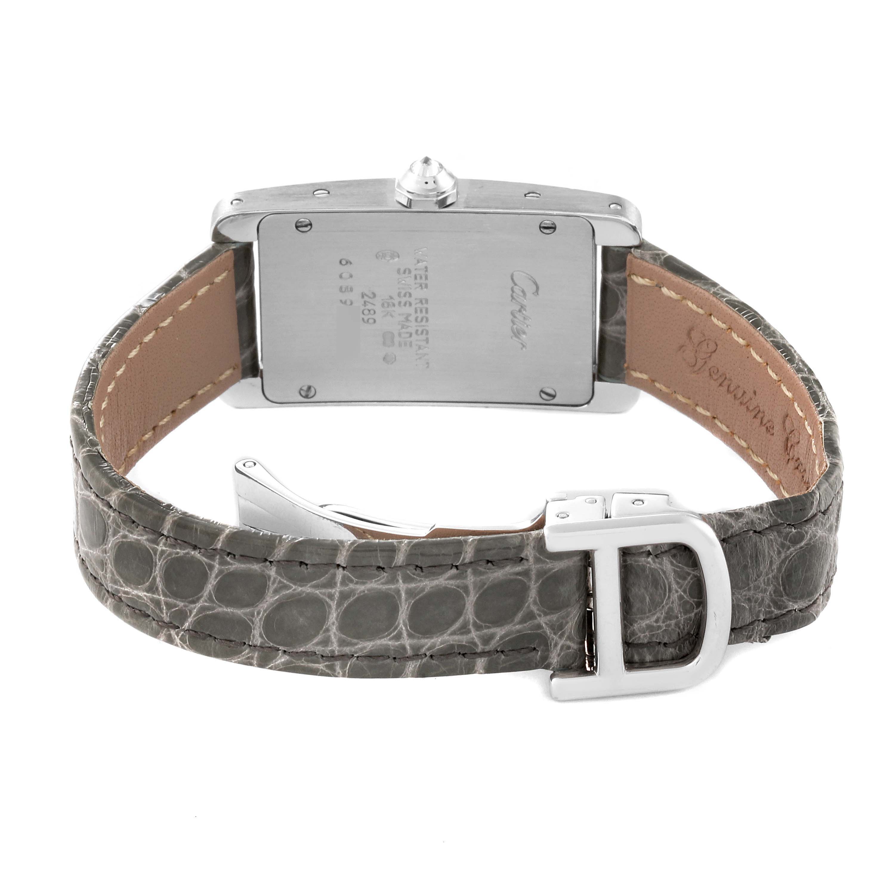 The image shows the back view of a Cartier Tank Americaine WB705131 Women's White Gold Grey Dial WB705131 Women's White Gold Grey Dial watch, highlighting its case back, crown, and grey leather strap with buckle.