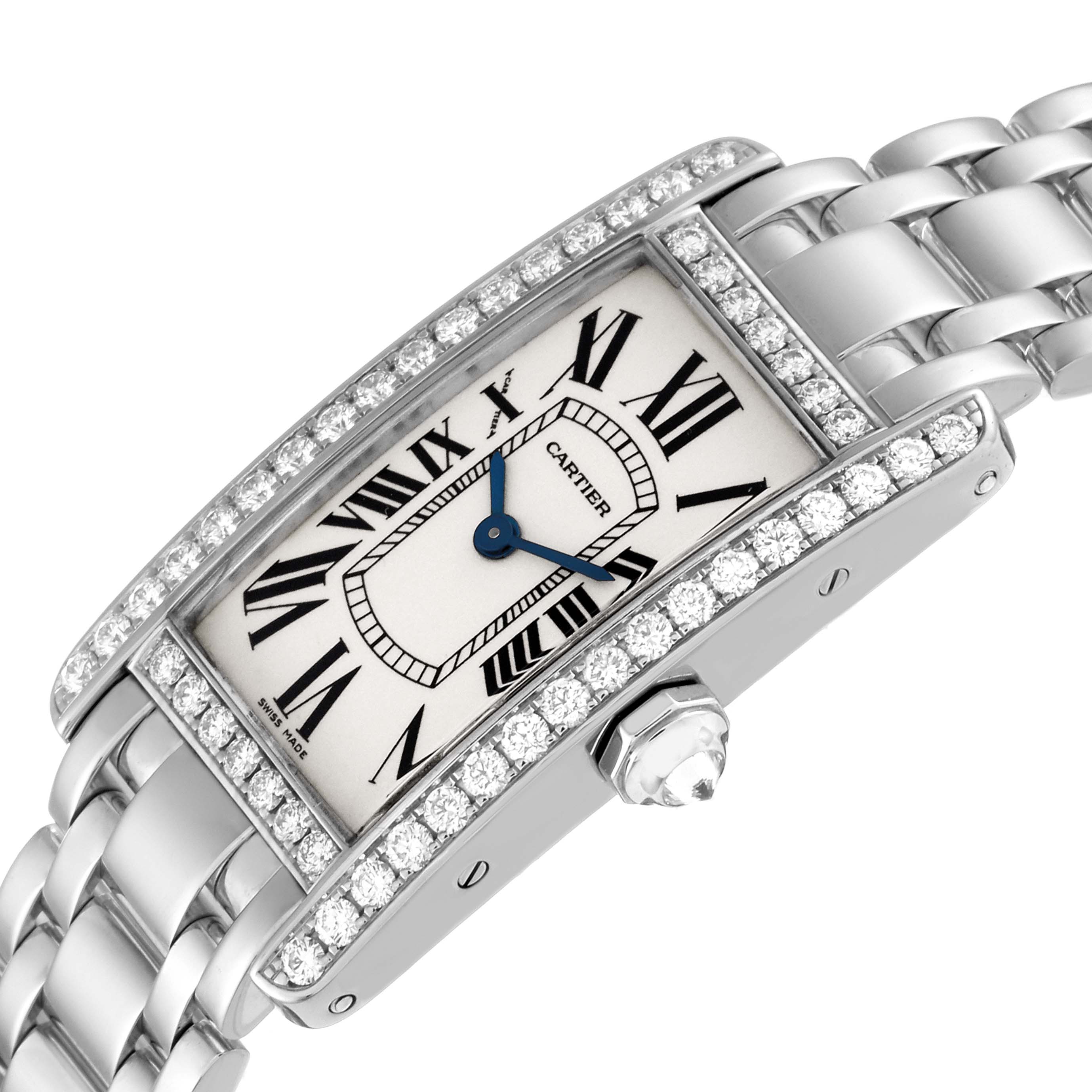 The Cartier Tank Americaine WB7018L1 Women's White Gold Silver Dial WB7018L1 Women's White Gold Silver Dial watch is shown in a close-up angle, highlighting the dial, bezel, blue hands, and part of the bracelet.
