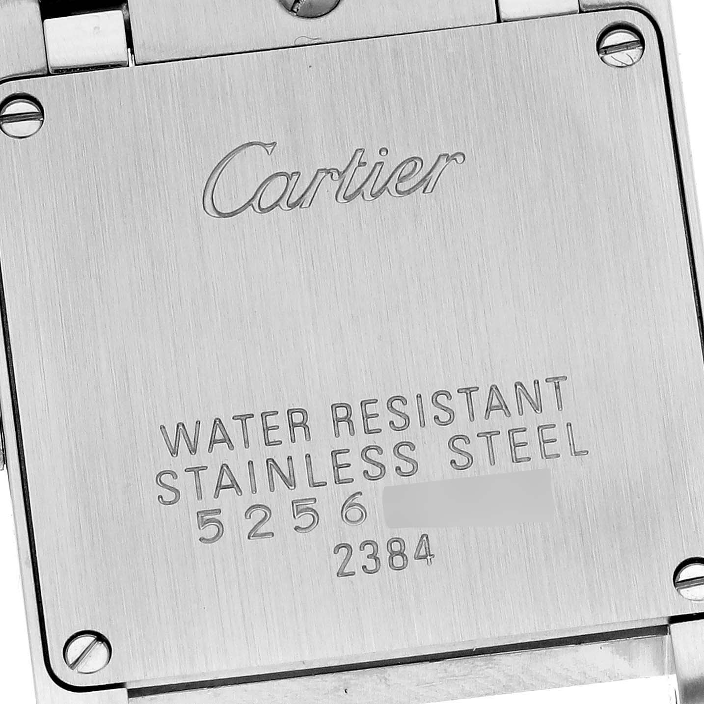This image shows the back case of a Cartier Tank Française watch, displaying water resistance, material, and serial number details.