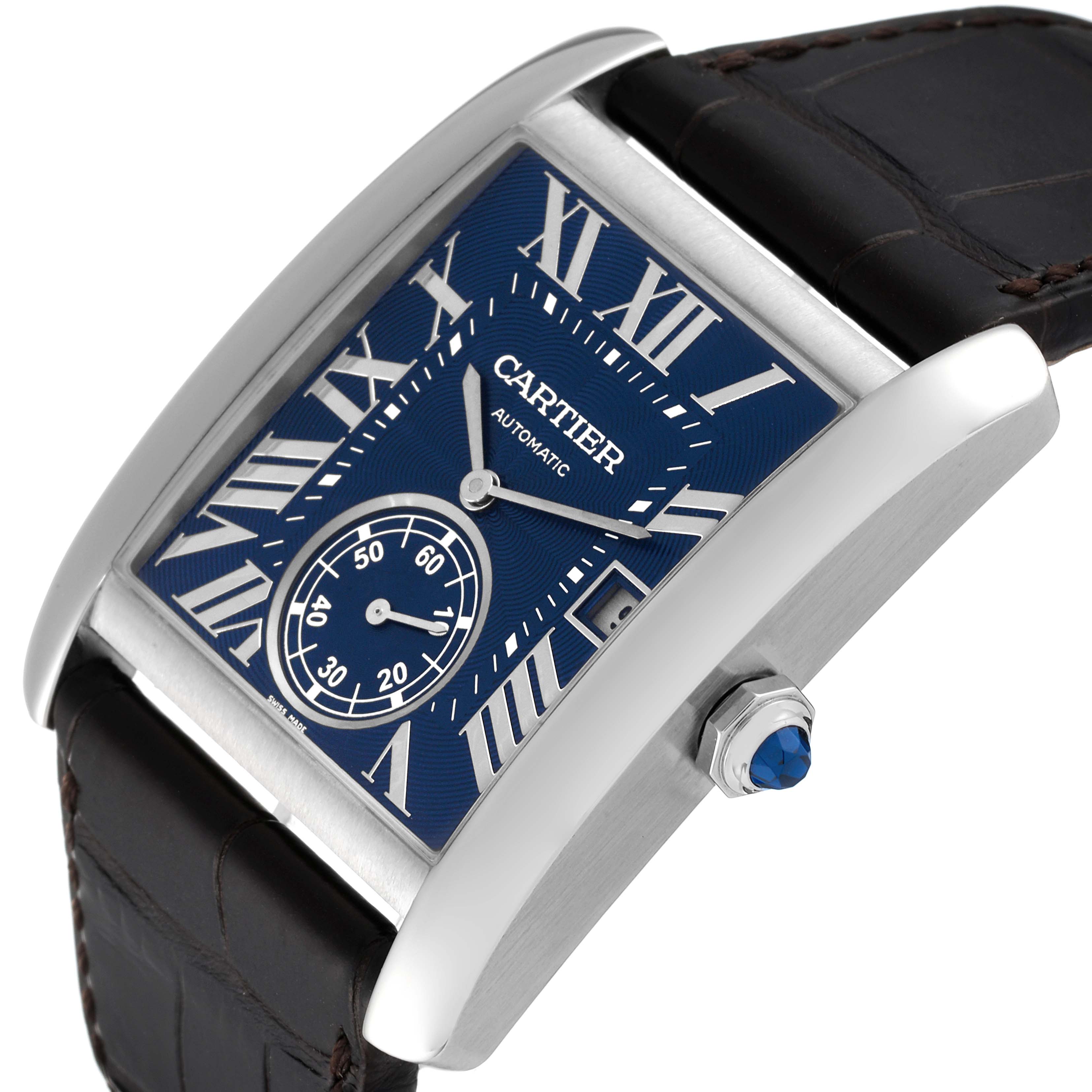 The Cartier Tank MC WSTA0010 Men's Stainless Steel Blue Dial WSTA0010 Men's Stainless Steel Blue Dial watch is shown at a slight angle, highlighting its blue dial, Roman numerals, and leather strap.