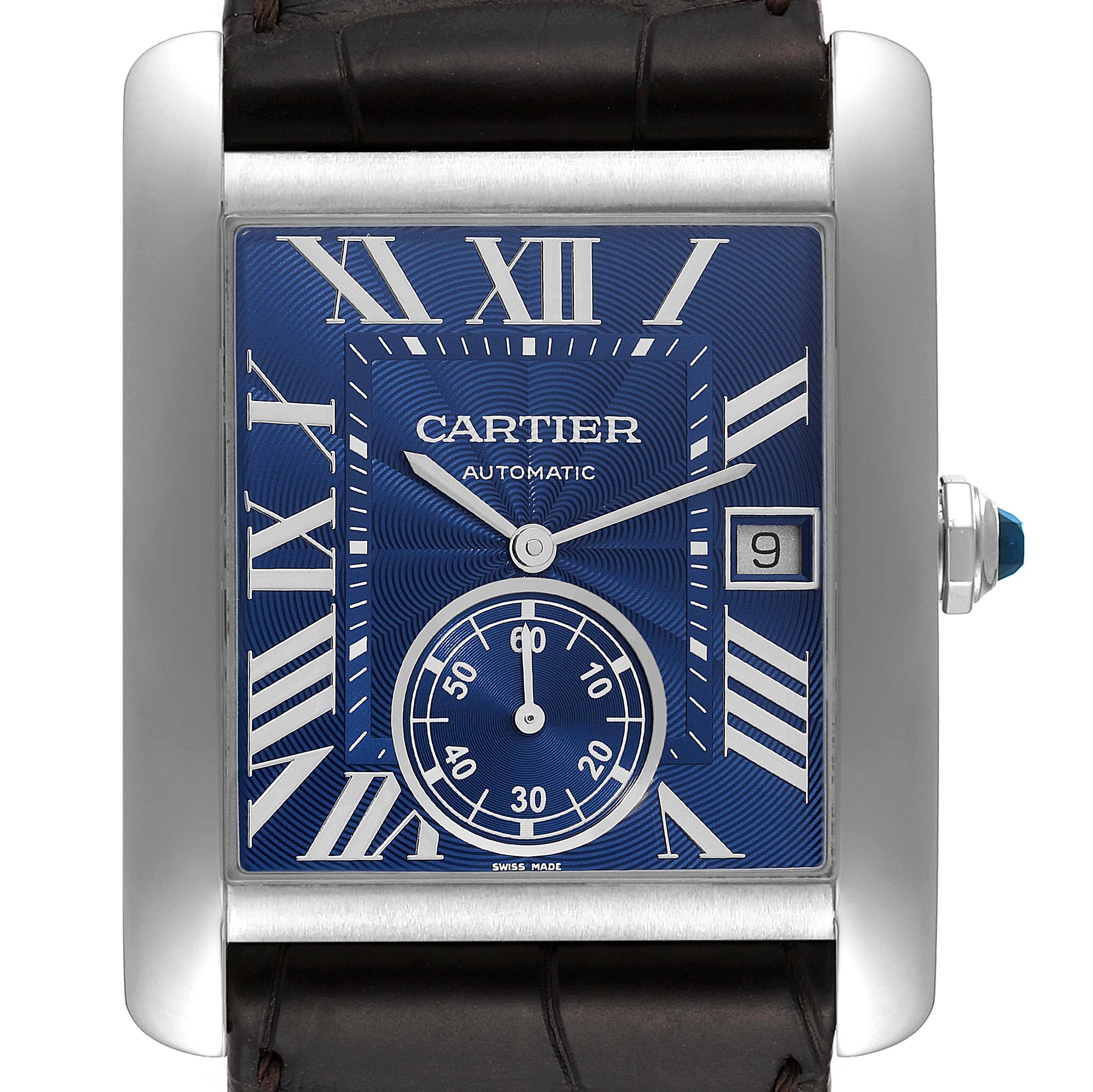 The Cartier Tank MC WSTA0010 Men's Stainless Steel Blue Dial WSTA0010 Men's Stainless Steel Blue Dial watch is shown from a front angle, highlighting its dial, hands, date window, and part of the leather strap.