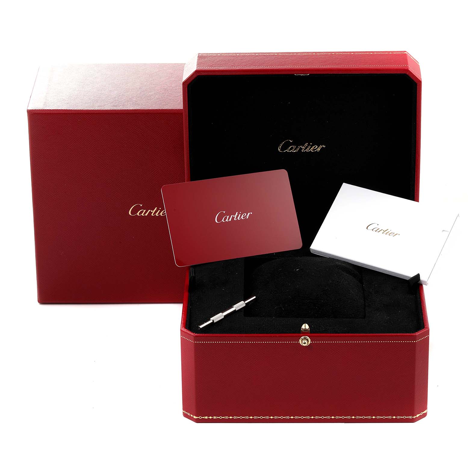 The image shows a Cartier Tank Must WSTA0040 Men's Stainless Steel Silver Dial WSTA0040 Men's Stainless Steel Silver Dial watch box with warranty cards and a small tool for adjustments.