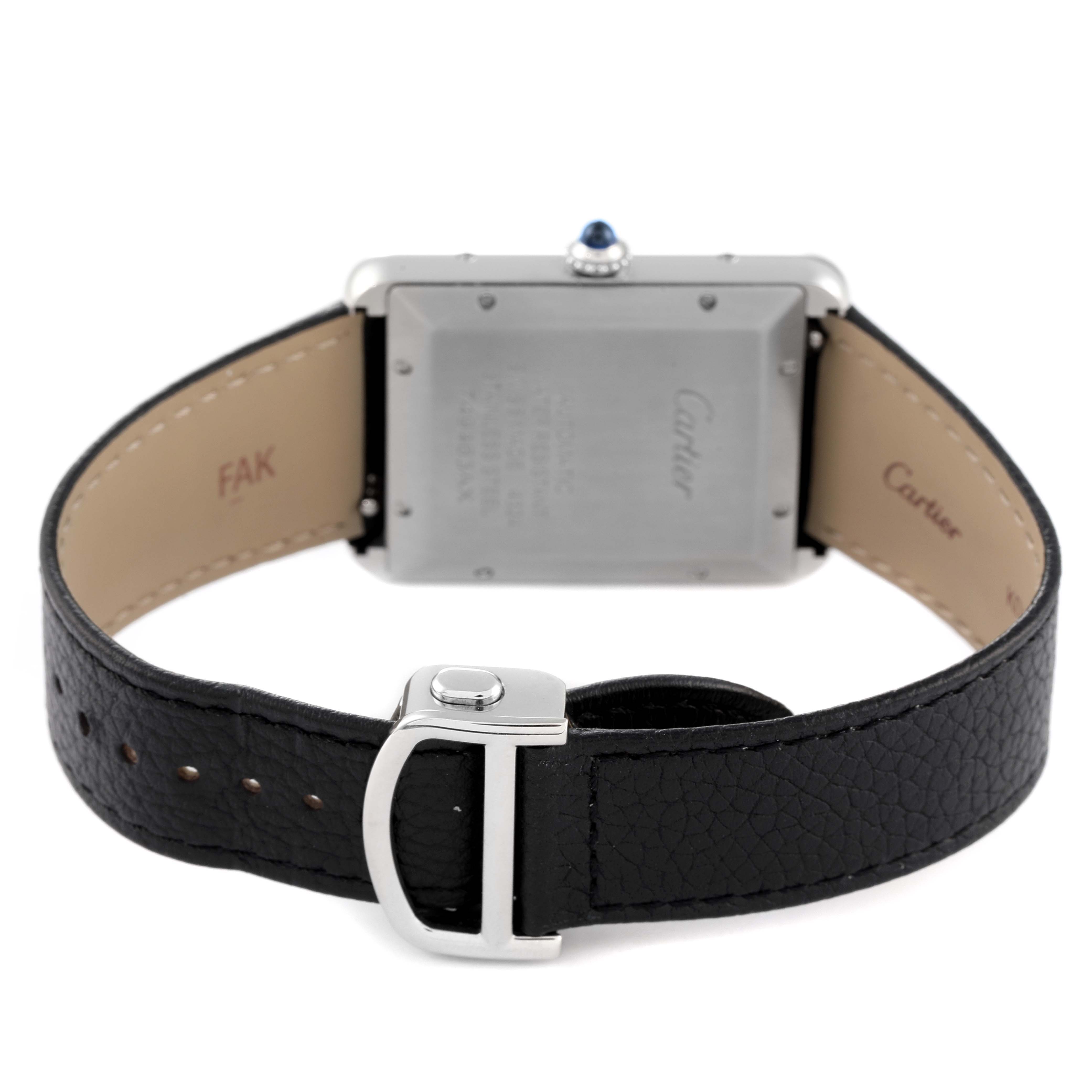 This image shows the back view of a Cartier Tank Must WSTA0040 Men's Stainless Steel Silver Dial WSTA0040 Men's Stainless Steel Silver Dial watch, highlighting the leather strap and buckle.