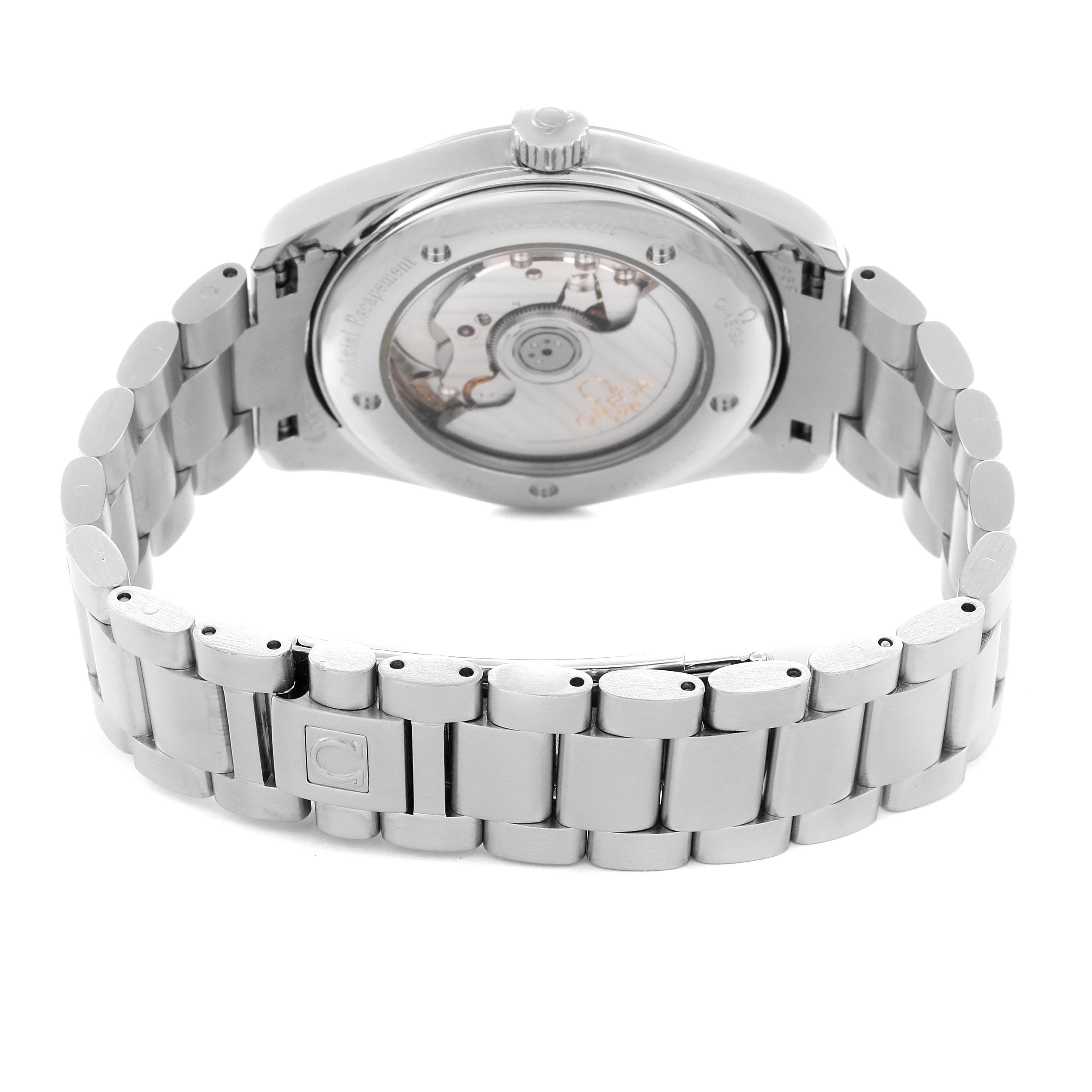 The image shows the back of the Omega Aqua Terra model 2503.33.00, highlighting its transparent case back and stainless steel bracelet.