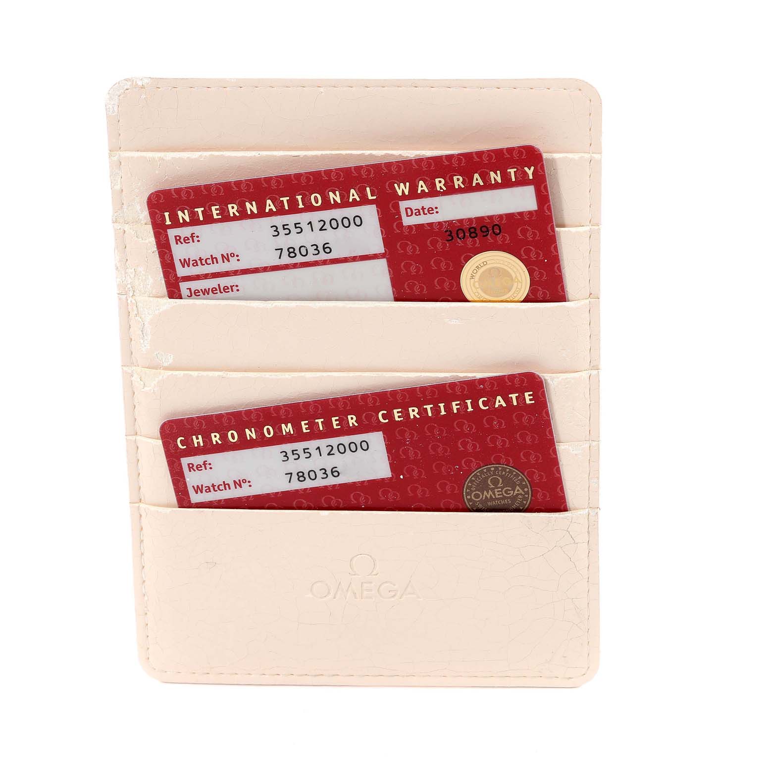 The image shows an Omega Speedmaster 3551.20.00 Men's Stainless Steel White Dial 3551.20.00 Men's Stainless Steel White Dial watch's international warranty and chronometer certificate cards in a cardholder.