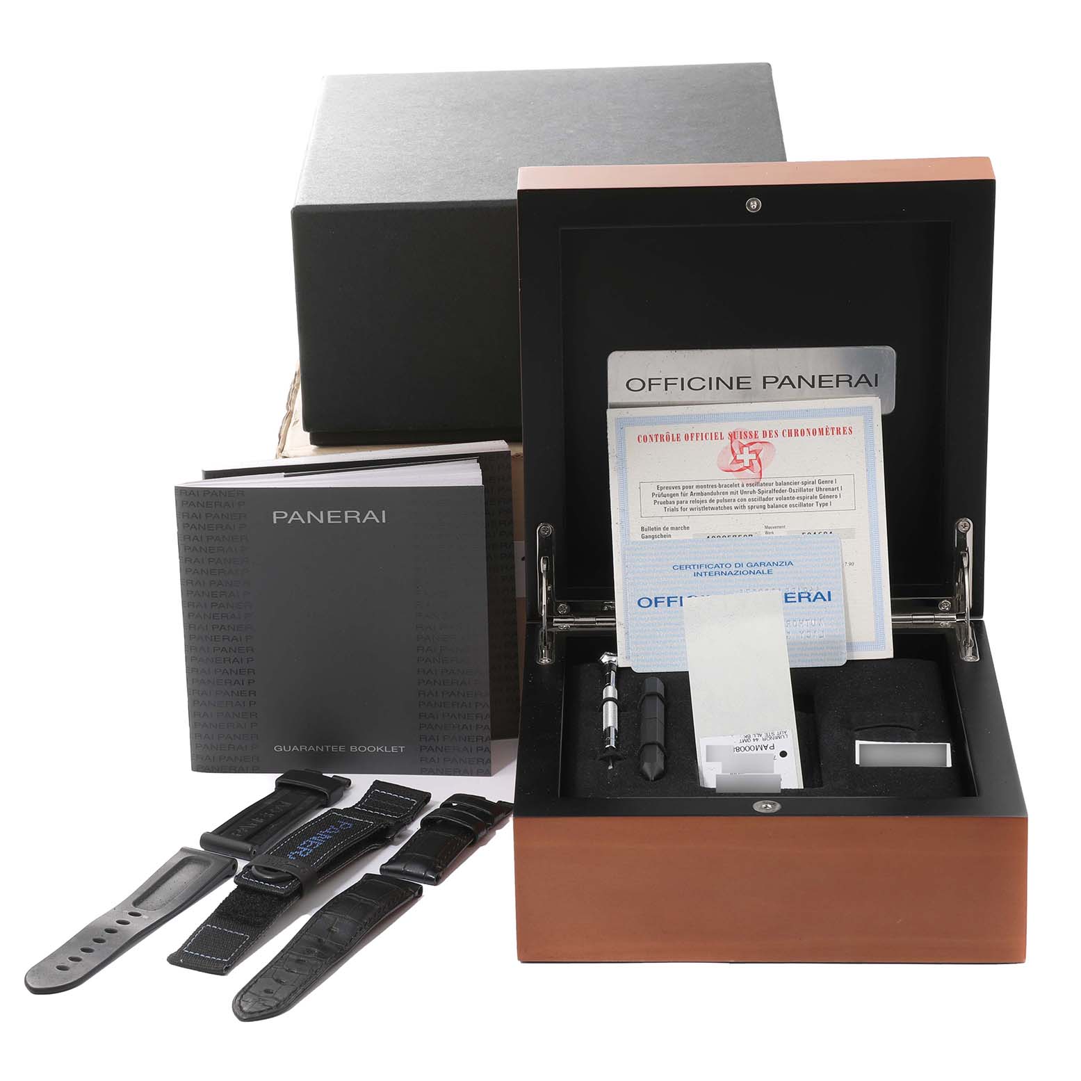 The image shows a Panerai Luminor PAM00088 Men
s Stainless Steel Black Dial PAM00088 Men
s Stainless Steel Black Dial watch box, documentation, extra straps, and tools.