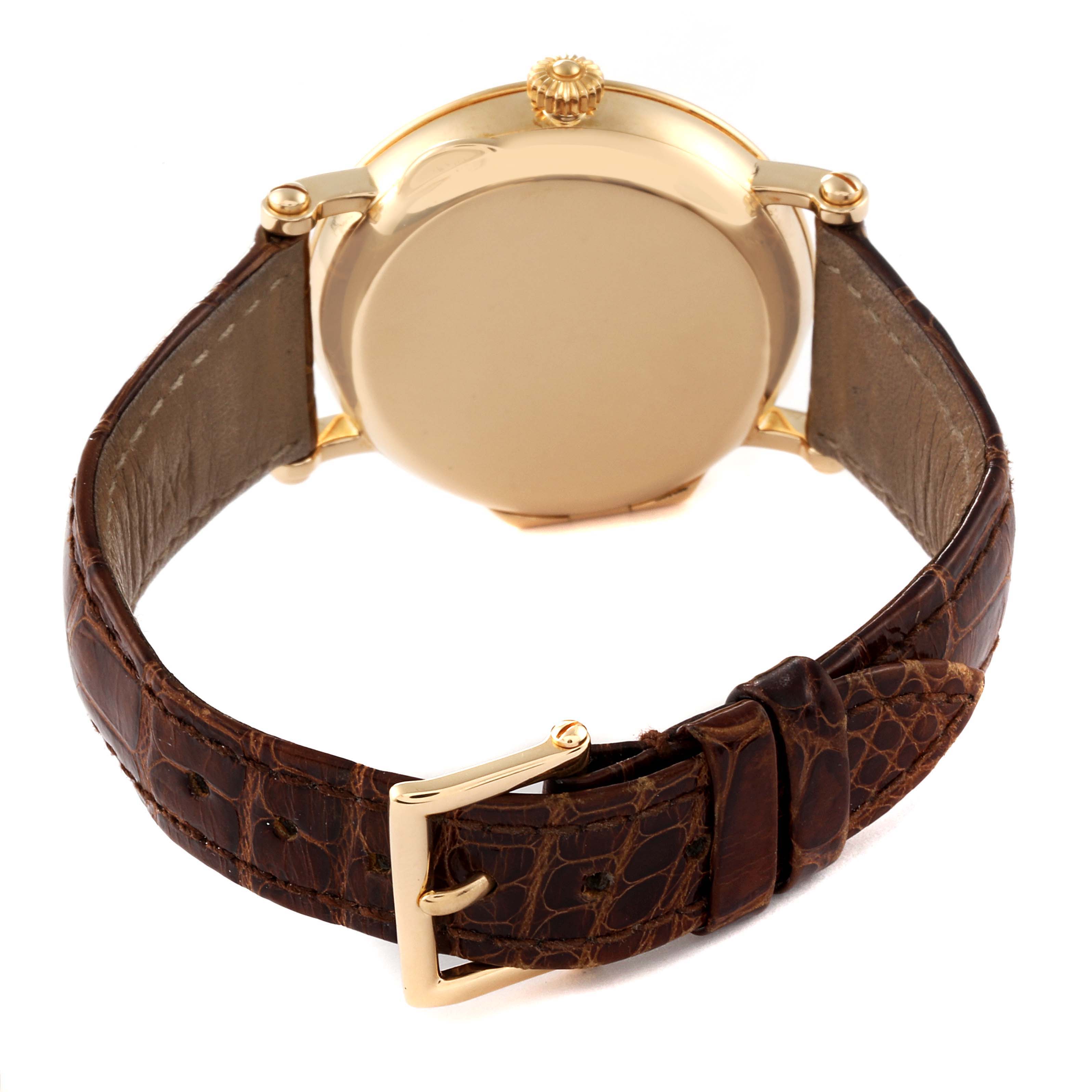 The image shows the back case and strap of a Patek Philippe Calatrava 5053 Men's Yellow Gold Beige Dial 5053 Men's Yellow Gold Beige Dial watch at a rear angle.