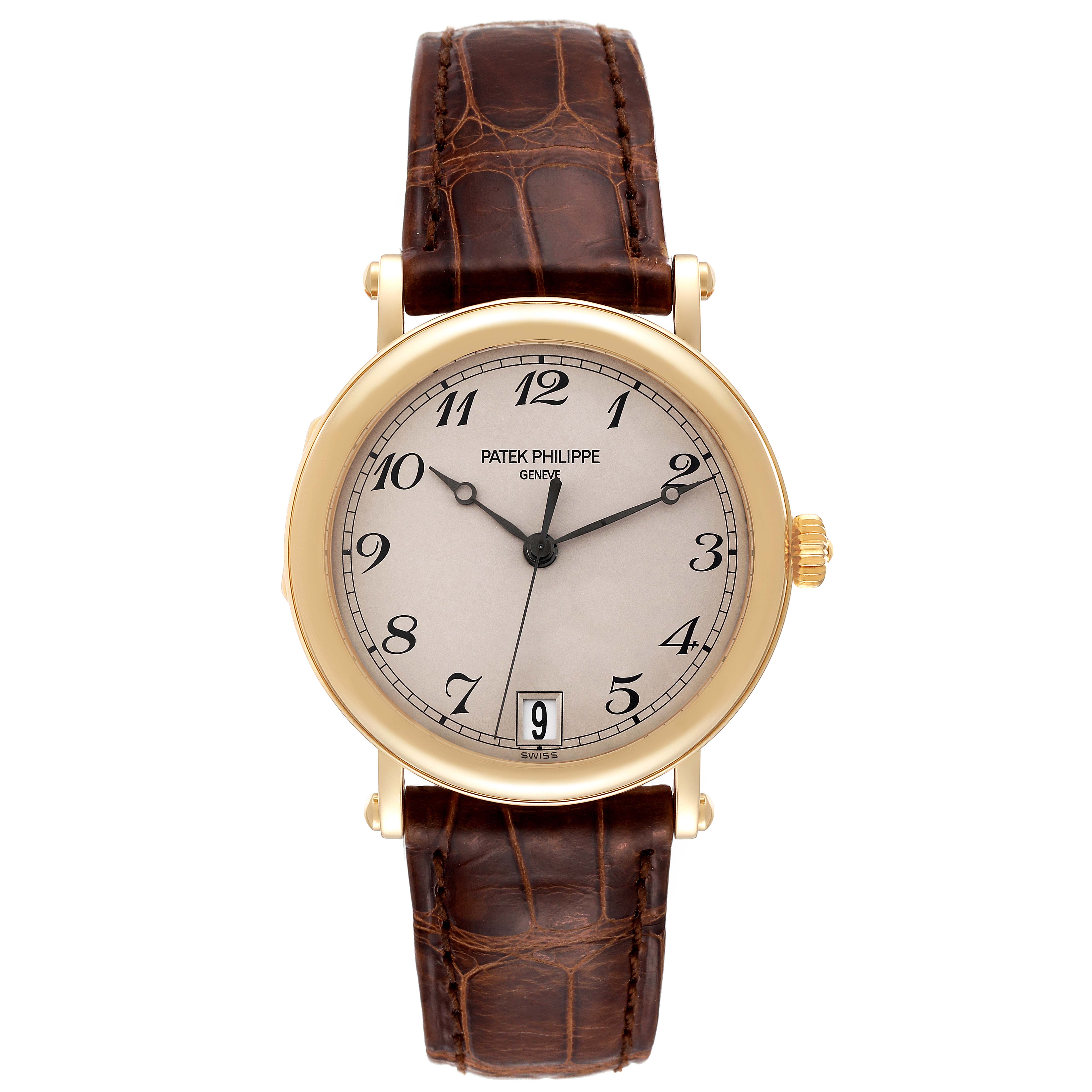 The image shows a front view of a Patek Philippe Calatrava 5053 Men's Yellow Gold Beige Dial 5053 Men's Yellow Gold Beige Dial watch, featuring a round dial, leather strap, and date display.