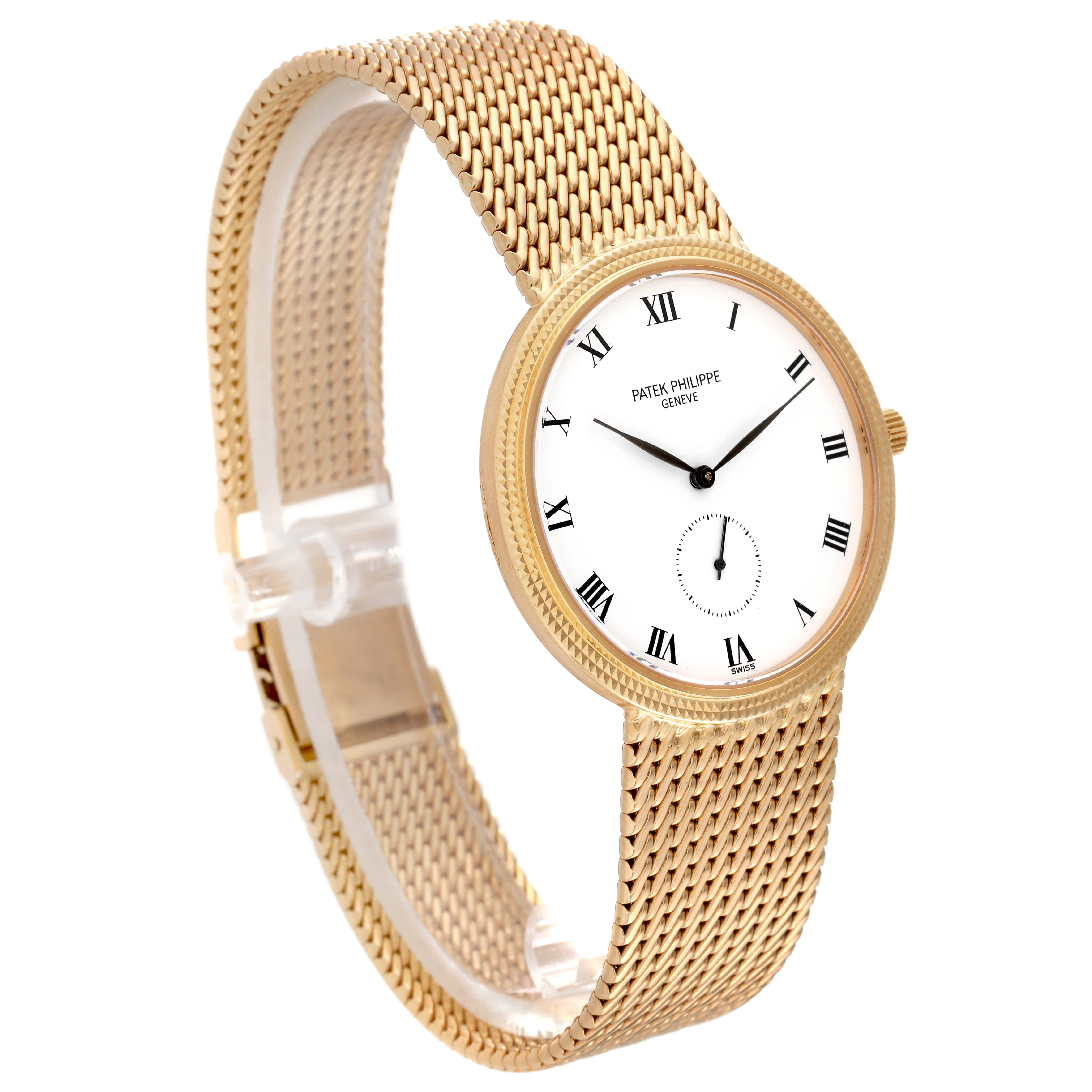 The image shows a Patek Philippe Calatrava 3919/5 Men
s Yellow Gold White Dial 3919/5 Men
s Yellow Gold White Dial watch from a front angle, highlighting its gold mesh bracelet and white dial with Roman numerals.