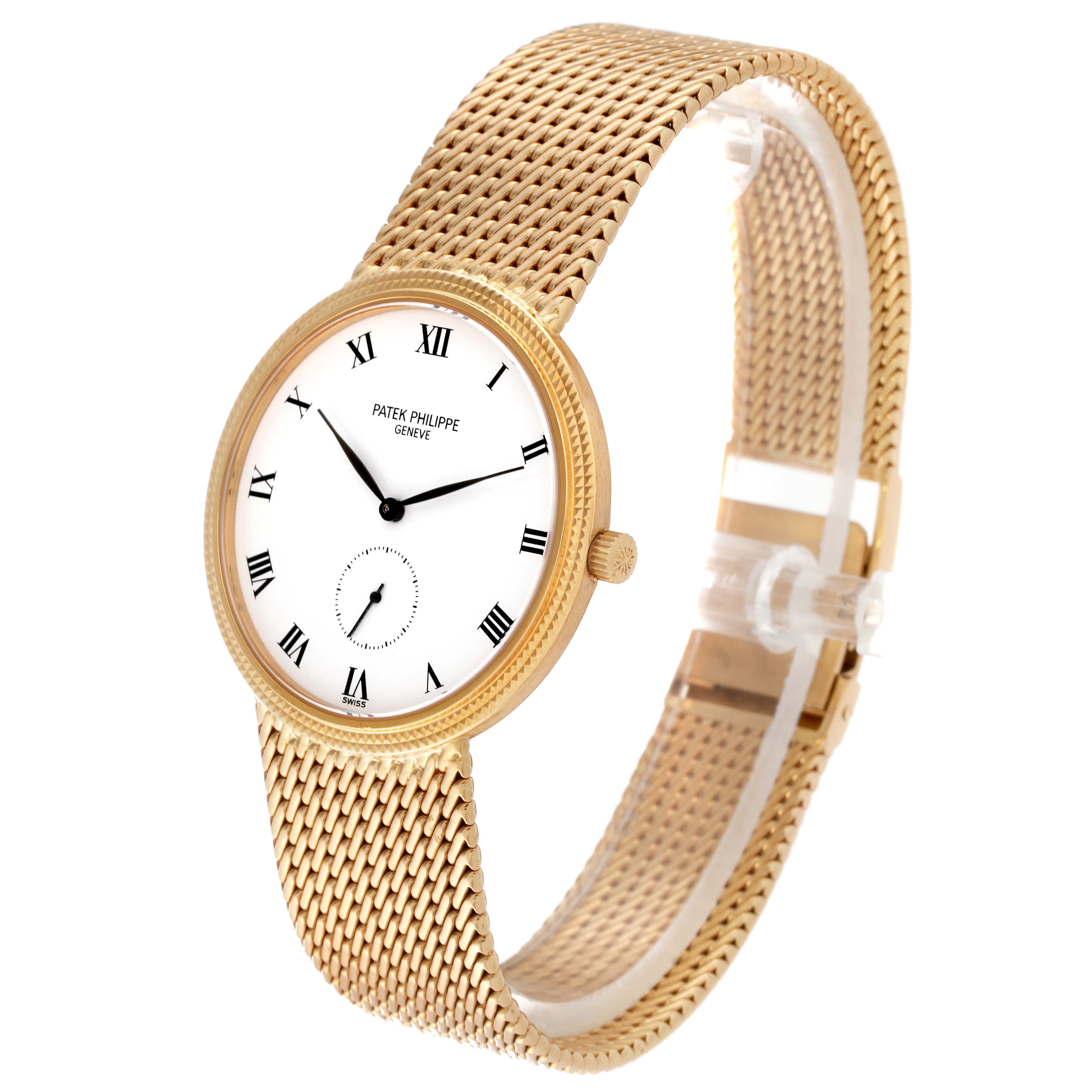 The Patek Philippe Calatrava 3919/5 Men
s Yellow Gold White Dial 3919/5 Men
s Yellow Gold White Dial watch is shown at an angle highlighting its gold mesh bracelet and white dial with Roman numerals.