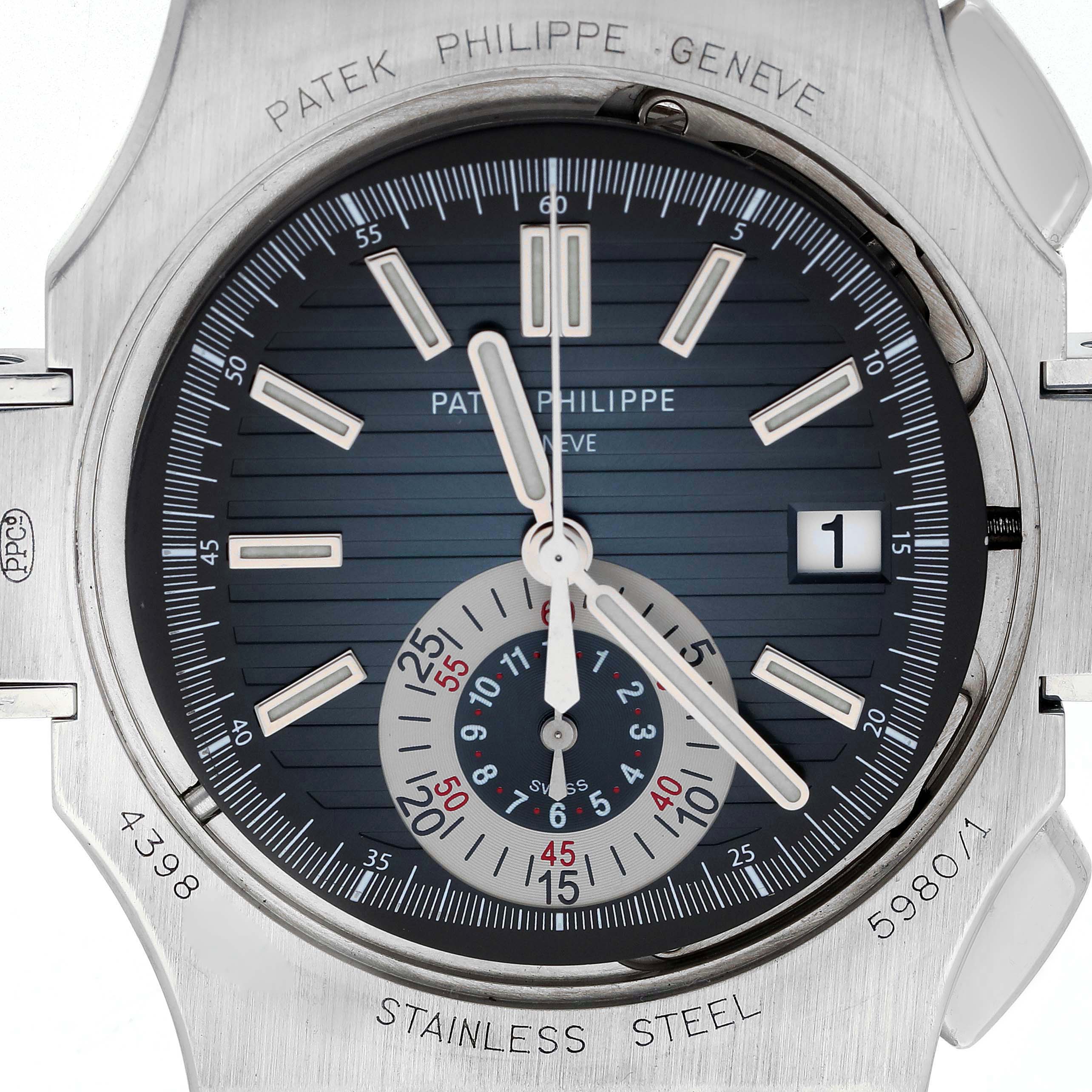 The image shows a close-up of the Patek Philippe Nautilus 5980/1A-001 watch face, highlighting the dial, chronograph subdial, date window, and case engraving.