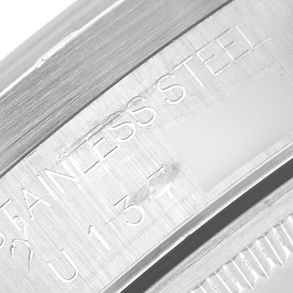 This image shows a close-up of the stainless steel case and bezel of the Rolex Air-King 14010 Men's Stainless Steel Black Dial 14010 Men's Stainless Steel Black Dial watch.