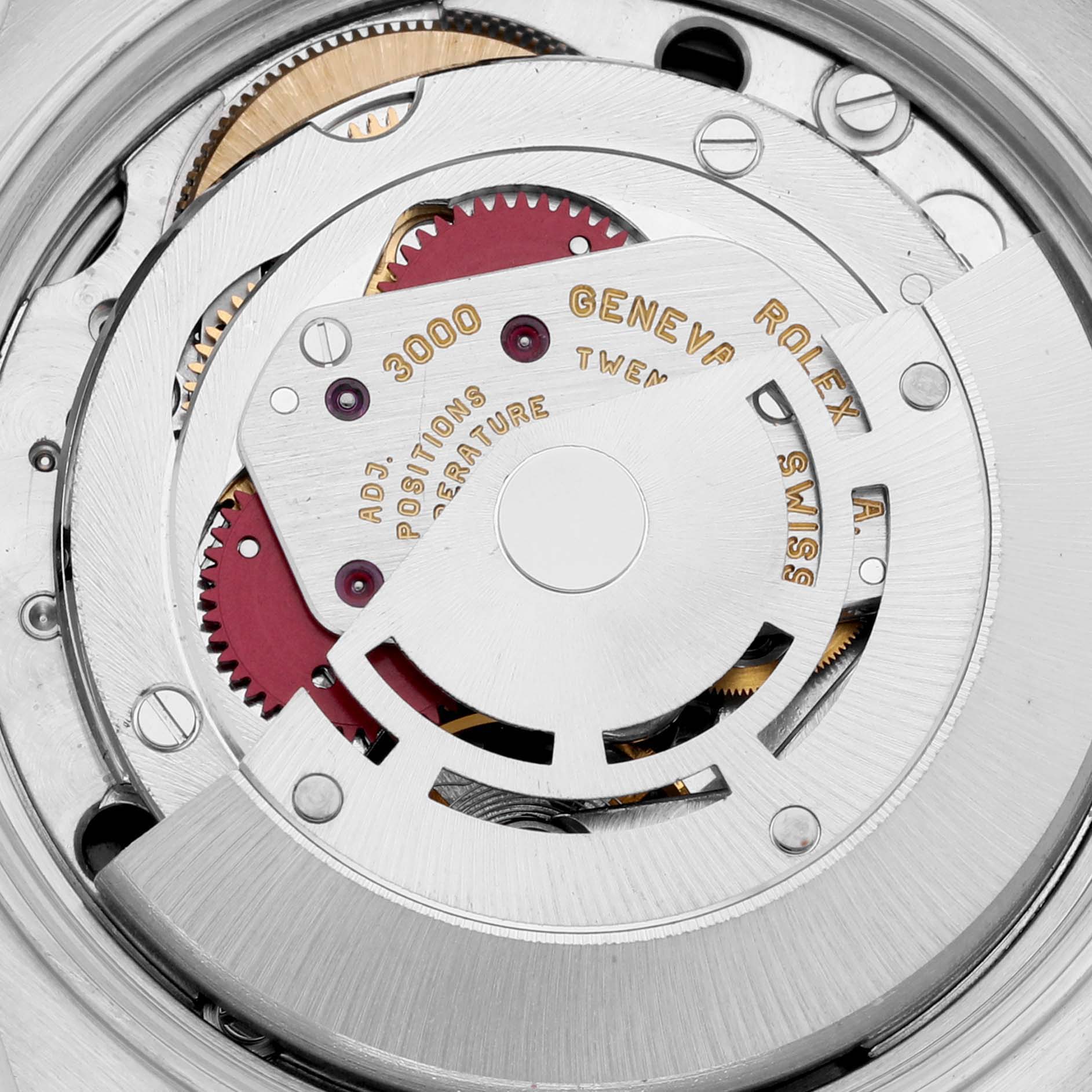 This image shows the inner movement mechanism of the Rolex Air-King 14010 Men's Stainless Steel Black Dial 14010 Men's Stainless Steel Black Dial watch, including gears, cogs, and the rotor.