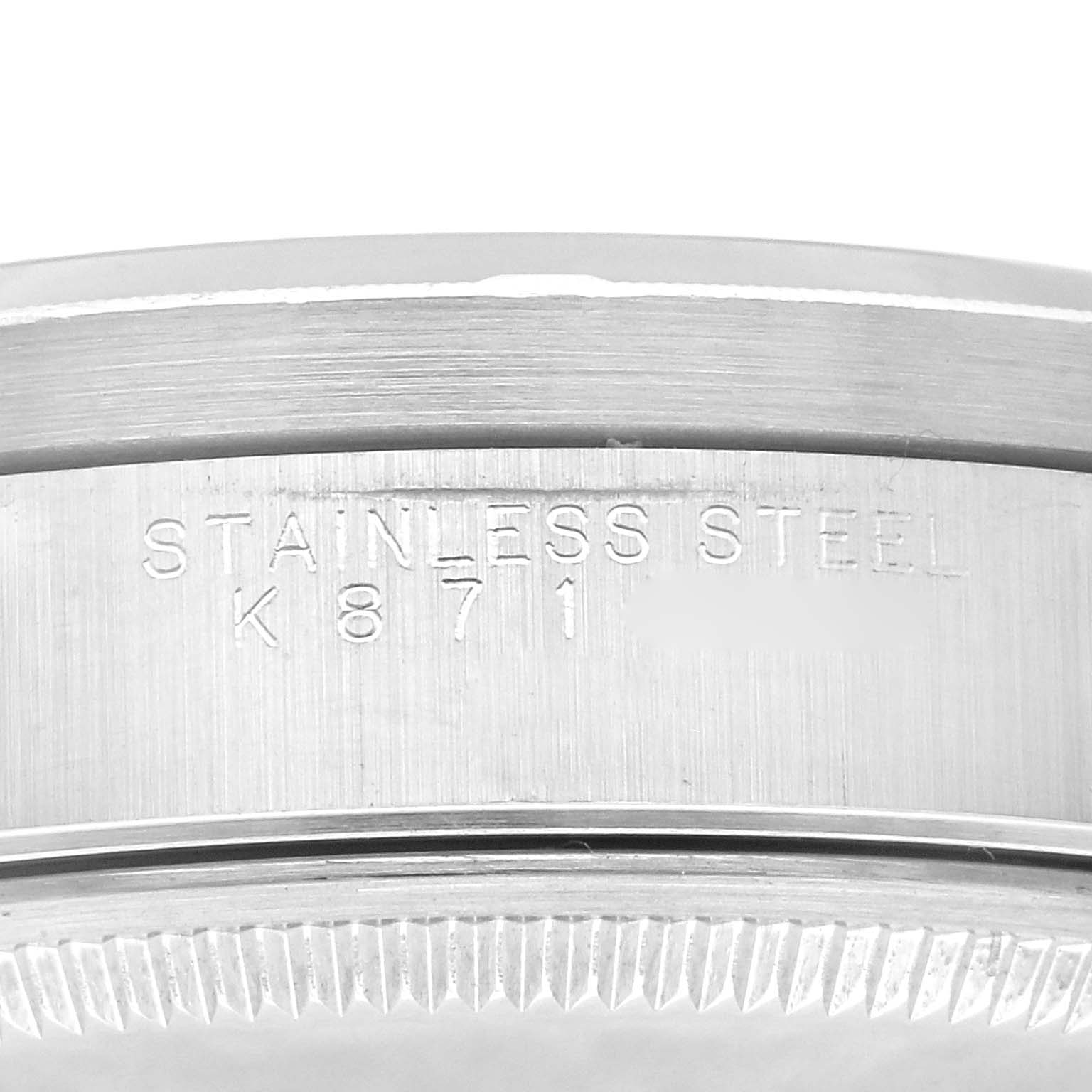 This image shows a close-up view of the side case engraving of a Rolex Air-King 14010M Men's Stainless Steel Black Dial 14010M Men's Stainless Steel Black Dial watch, marked "STAINLESS STEEL K 871".