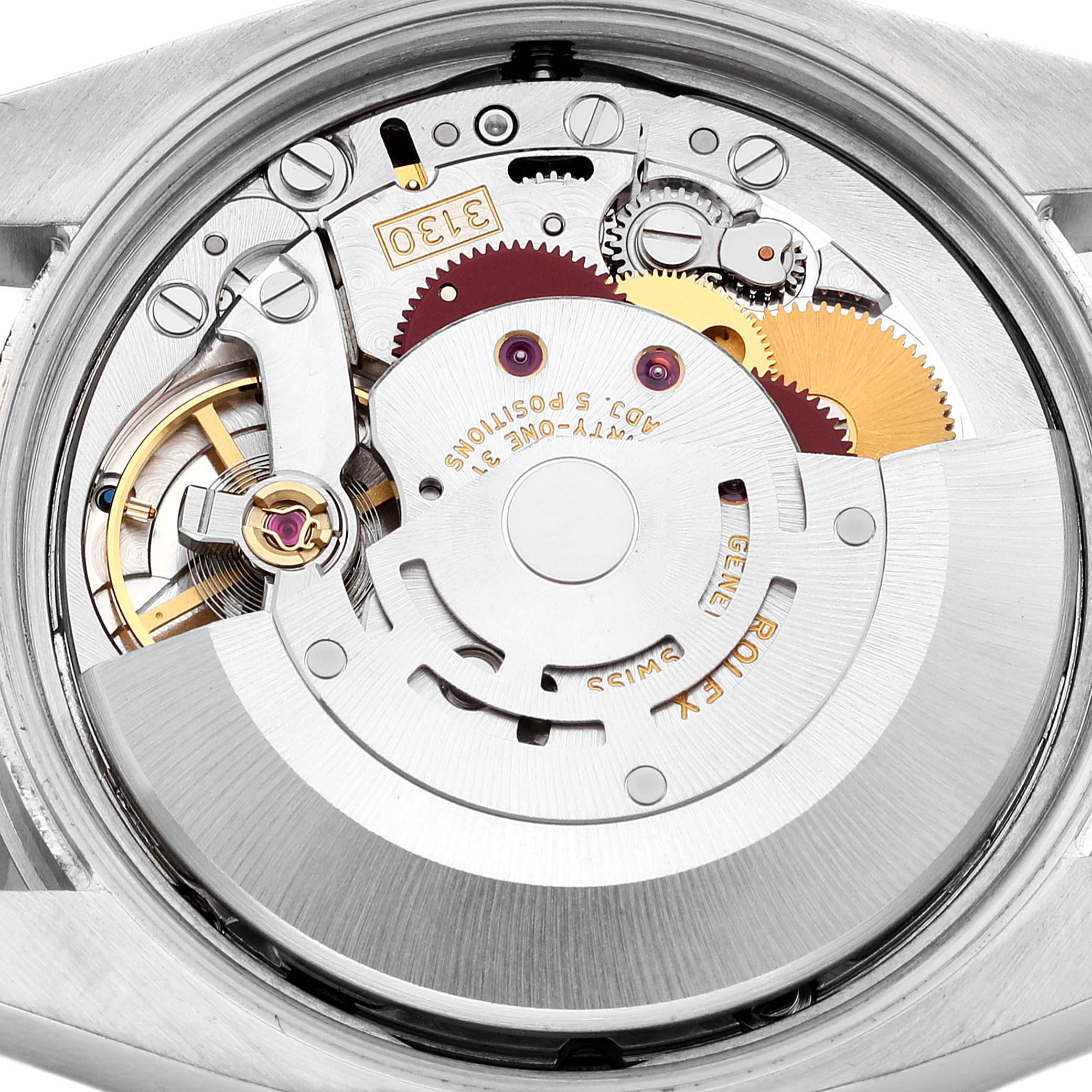 The image shows the internal mechanism of the Rolex Air-King 114200 Men's Stainless Steel Silver Dial 114200 Men's Stainless Steel Silver Dial watch from a back view.