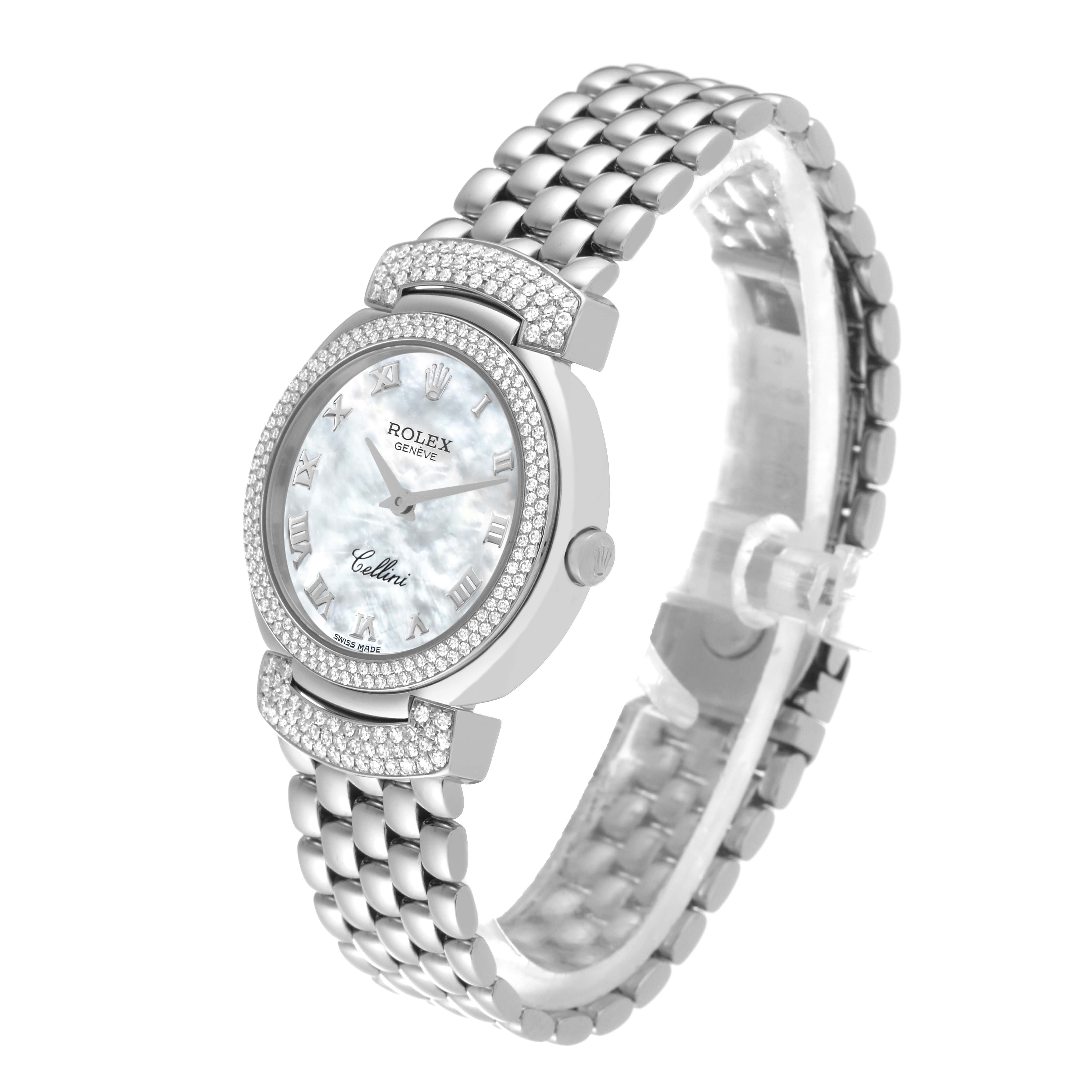 The Rolex Cellini 6673 Women's White Gold Mother of Pearl Dial watch is shown at a three-quarter angle, highlighting the dial, bezel, and bracelet.
