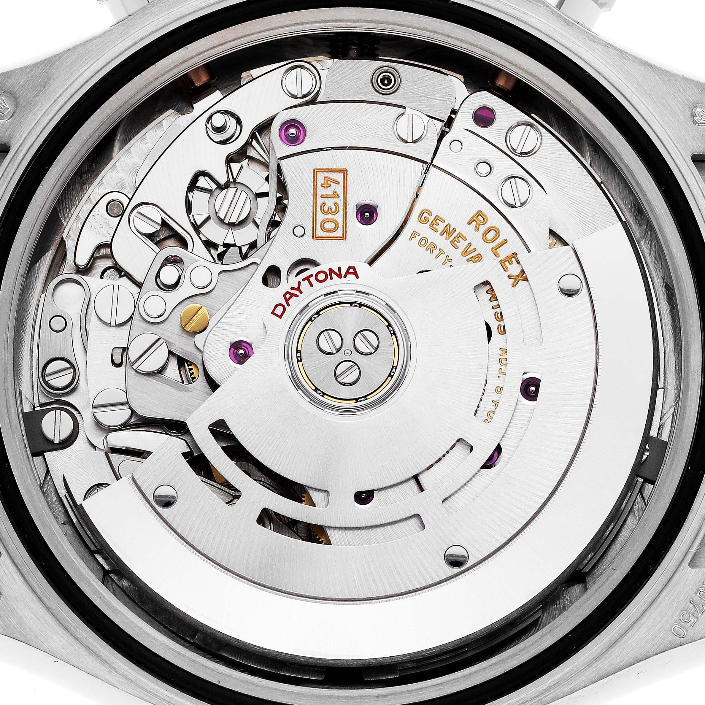 This image shows a close-up view of the Rolex Daytona 116519 Men's White Gold Black Dial 116519 Men's White Gold Black Dial watch's internal movement components, including gears and inscriptions.