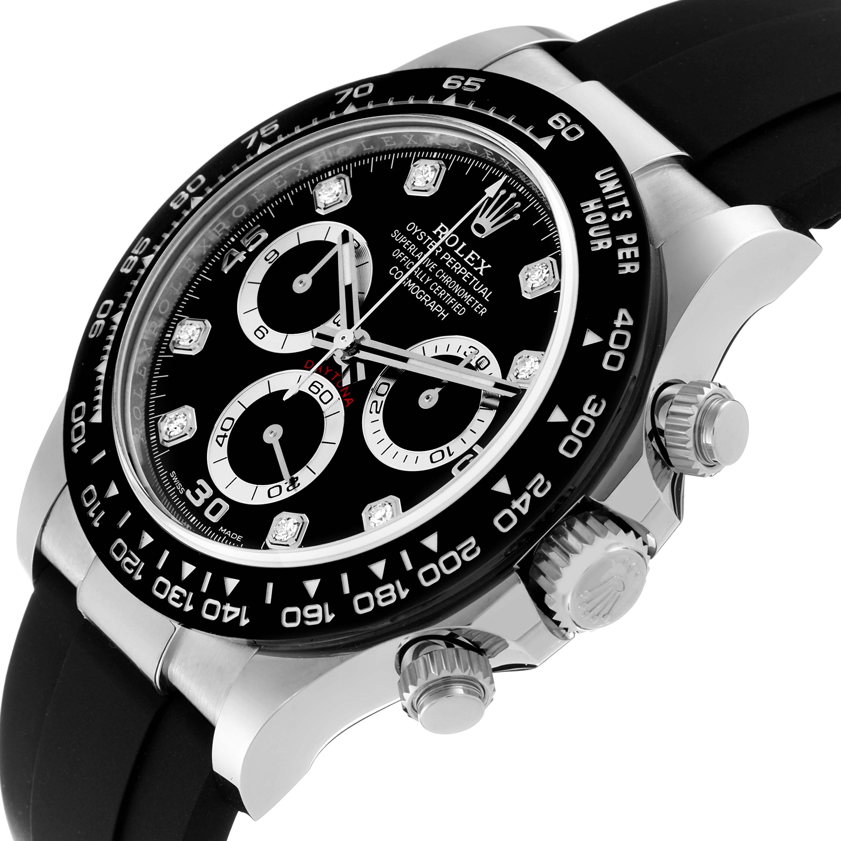 The image shows a Rolex Daytona 116519 Men's White Gold Black Dial 116519 Men's White Gold Black Dial watch at an angled close-up, highlighting its black dial, tachymeter bezel, three sub-dials, and crown.