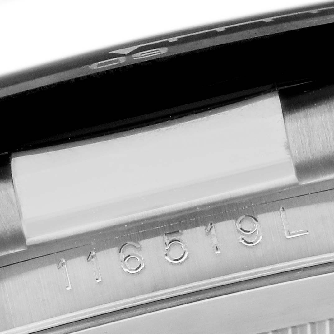 This image shows a close-up of the case edge and serial number of a Rolex Daytona 116519 Men's White Gold Black Dial 116519 Men's White Gold Black Dial watch.