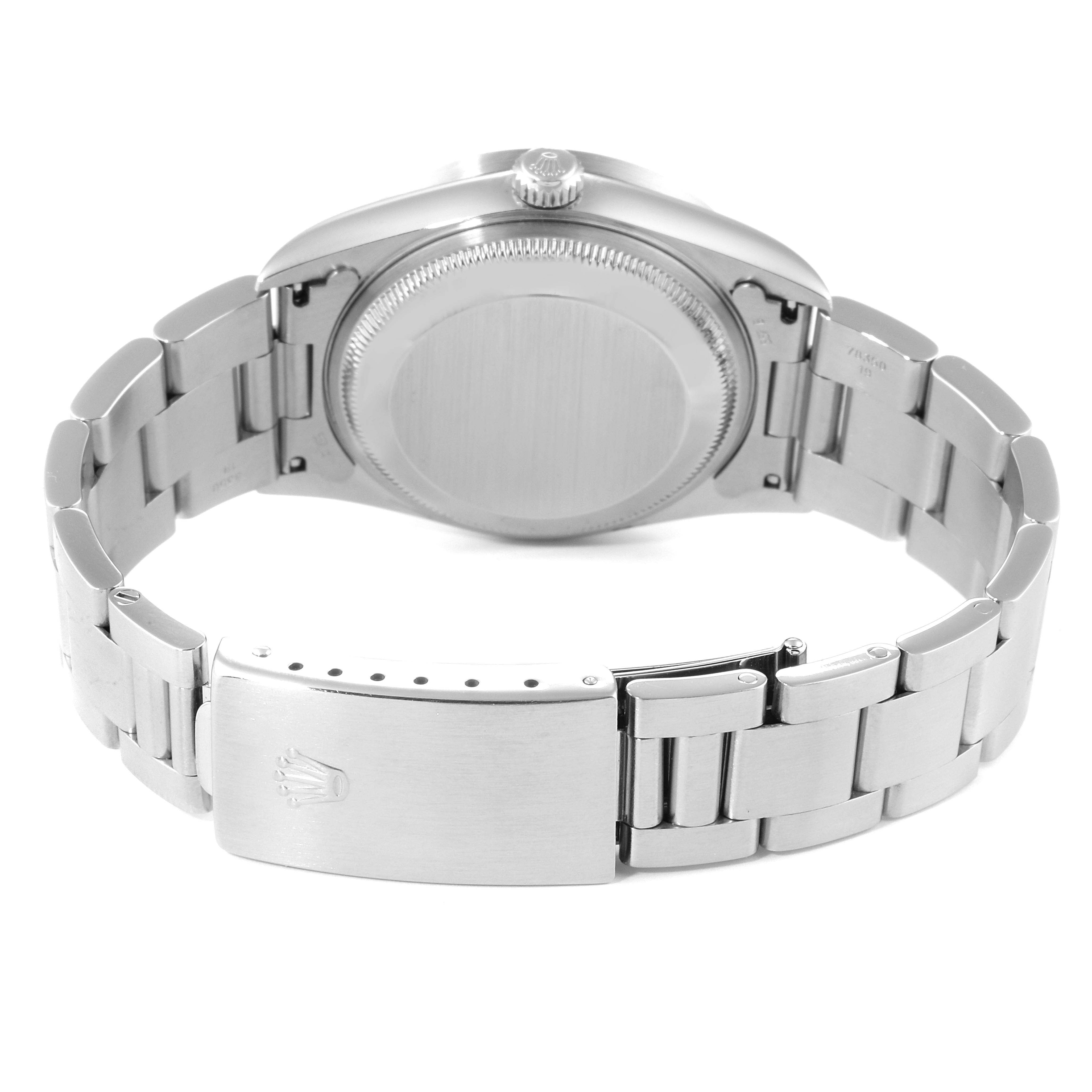 This image shows the back view of a Rolex Date 15210 Men's Stainless Steel Black Dial 15210 Men's Stainless Steel Black Dial model watch, including the case back, crown, and bracelet with clasp.