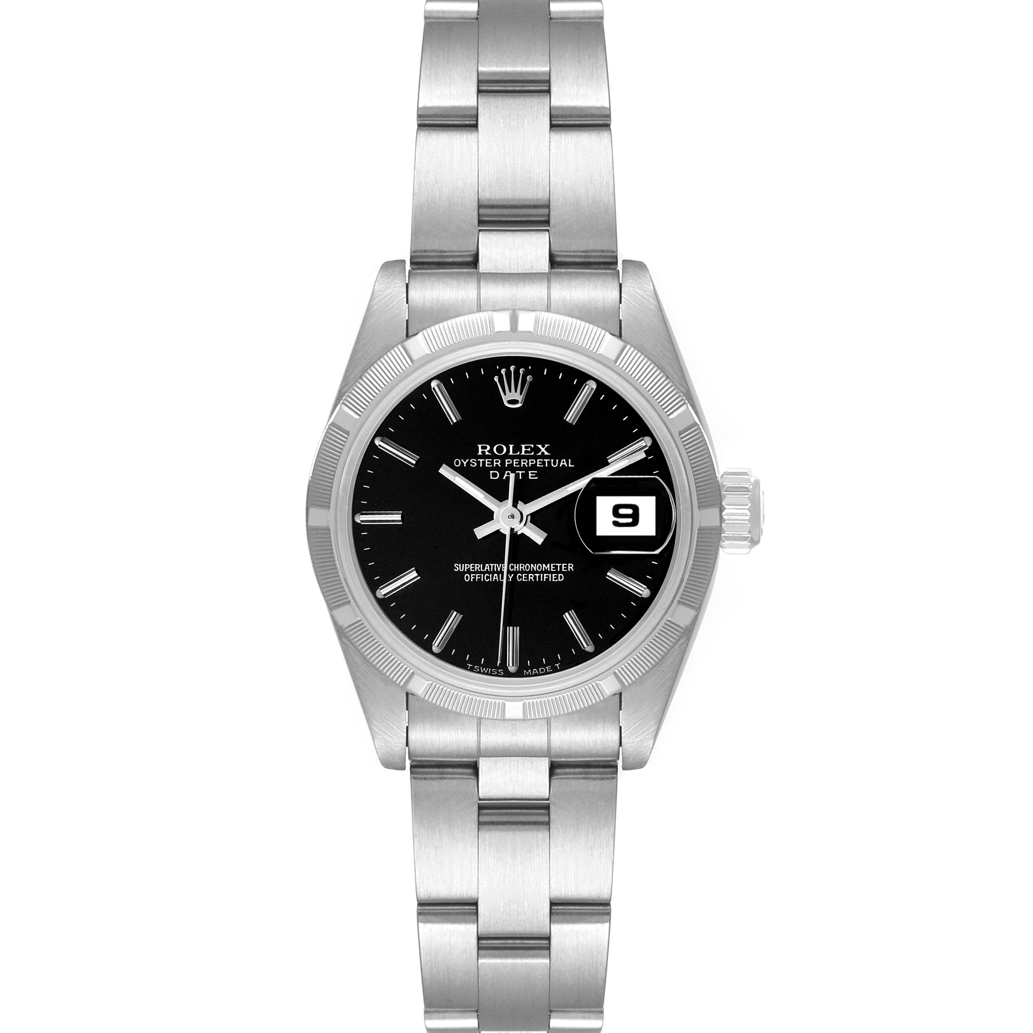 The image shows a front view of a Rolex Oyster Perpetual Date watch, highlighting its black dial and date window at 3 o
clock.